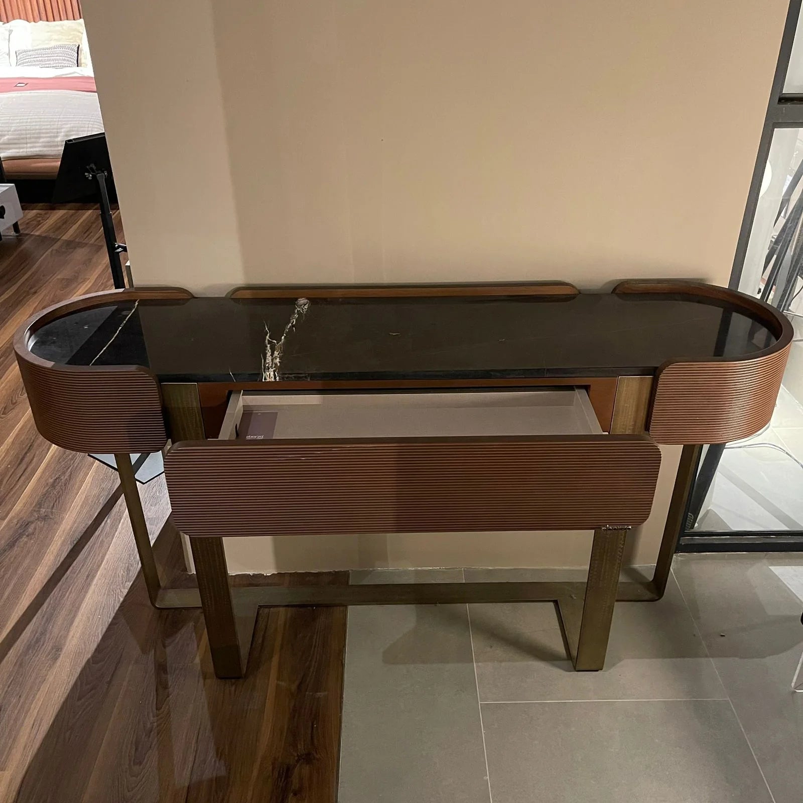 Amber dresser from Loda Furniture, model Ambrdr-041, featuring a warm wood finish and sleek design, displayed as a showcase item.
