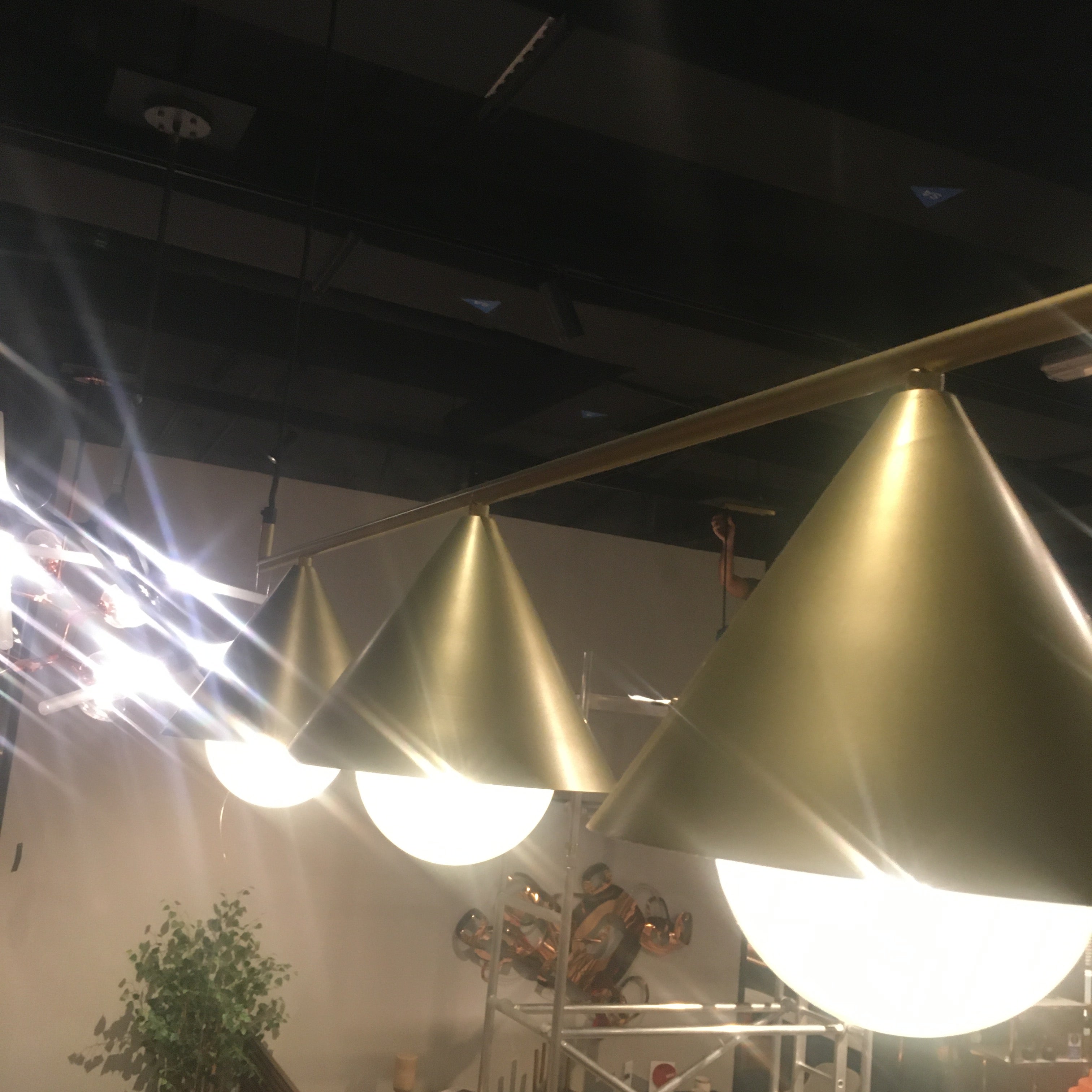 Display of the Andria 3 Heads Pendant Lamp by Beacon, featuring sleek hanging design and modern pendant lighting.