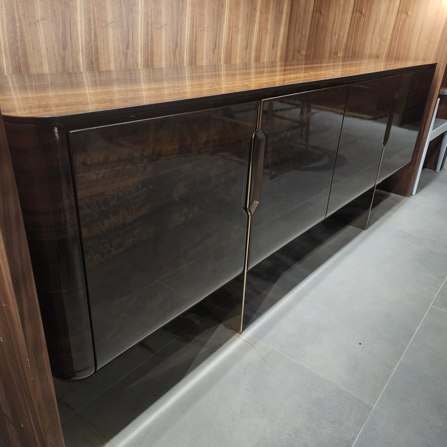 Saloni Arpage sideboard with sleek wooden finish, featuring spacious drawers and cabinet doors for modern storage.