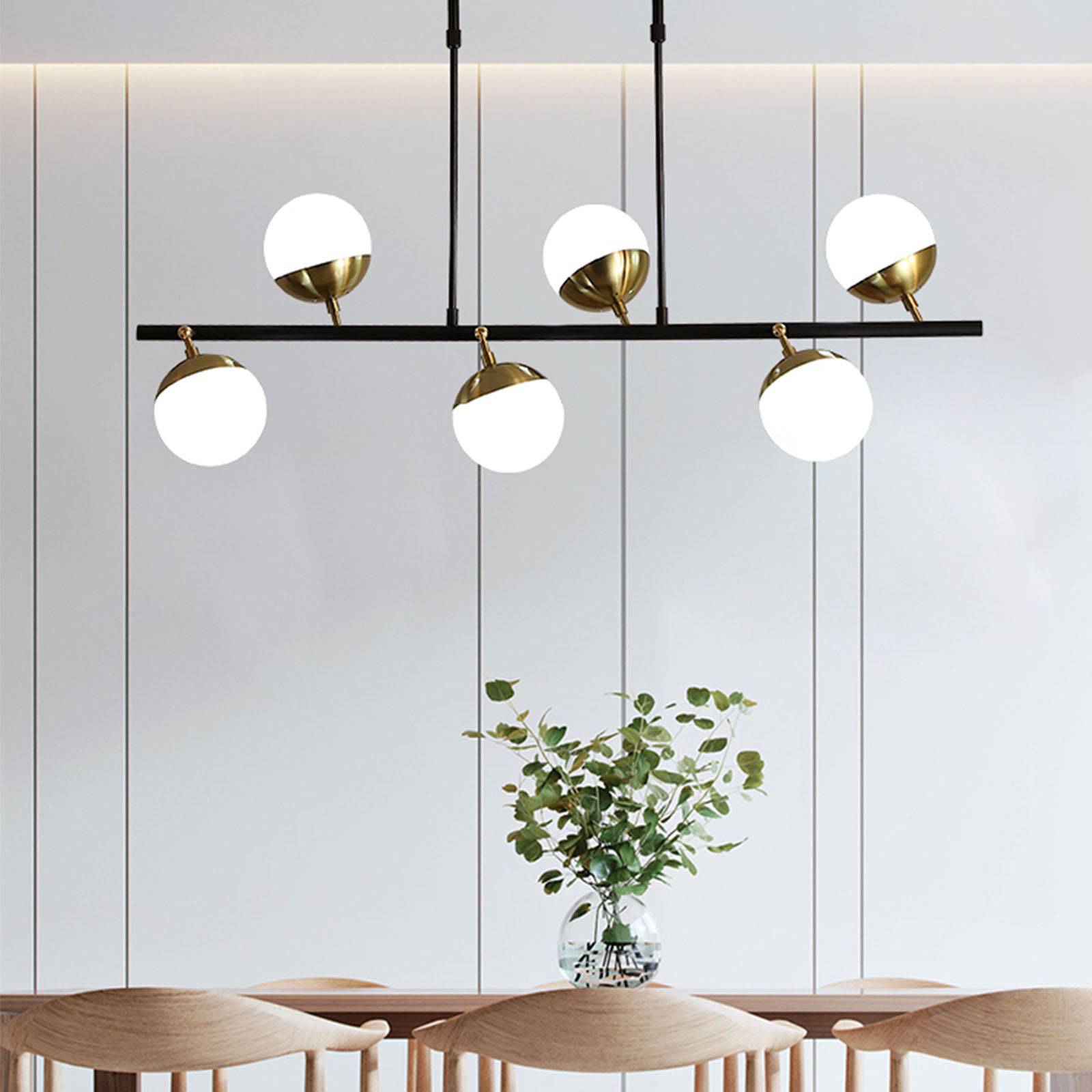 Display of Arvika 6 Heads Pendant Lamp by Beacon, showcasing modern hanging light fixture with six adjustable heads.