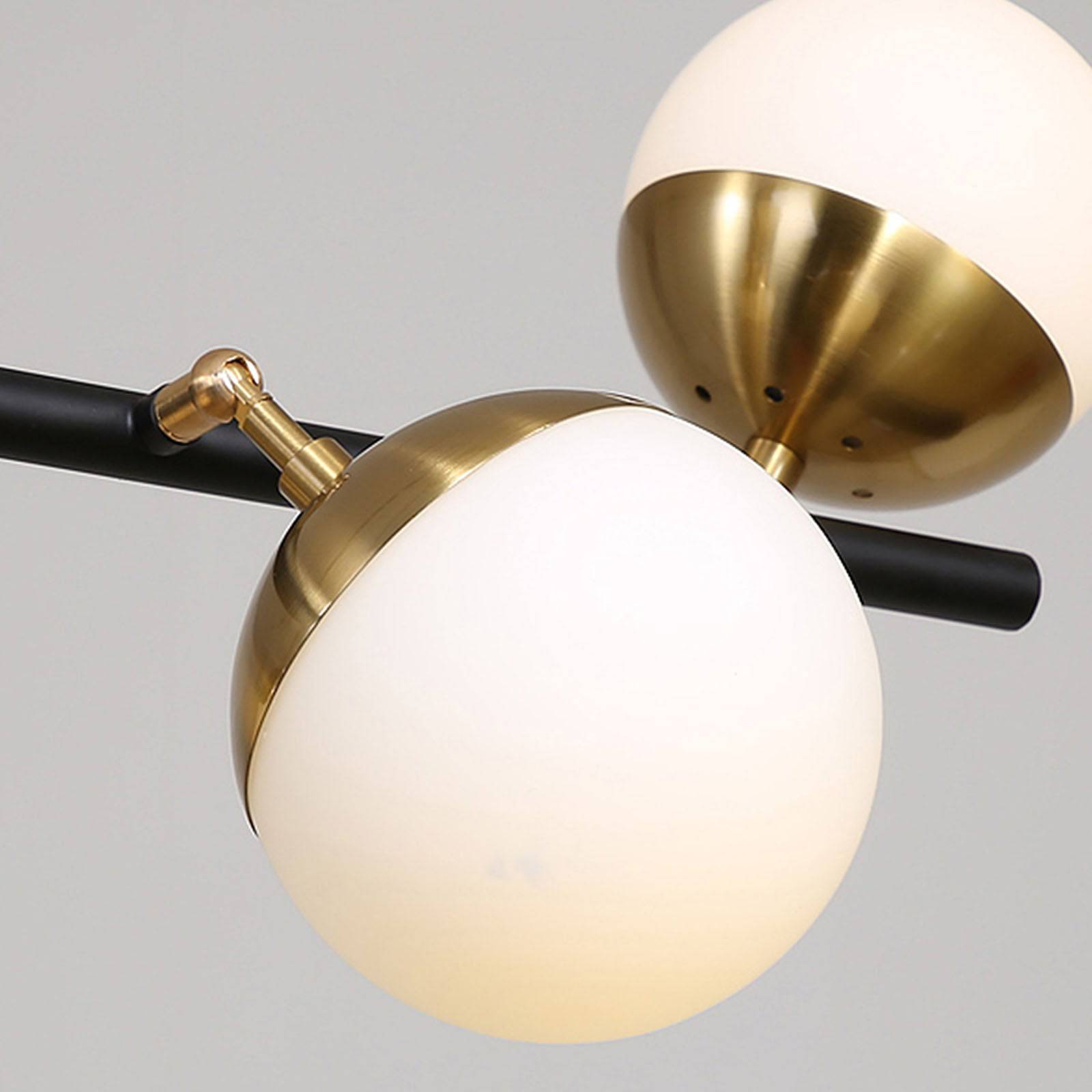 Display of Arvika 6 Heads Pendant Lamp by Beacon, modern ceiling light with six adjustable pendant heads for stylish illumination.