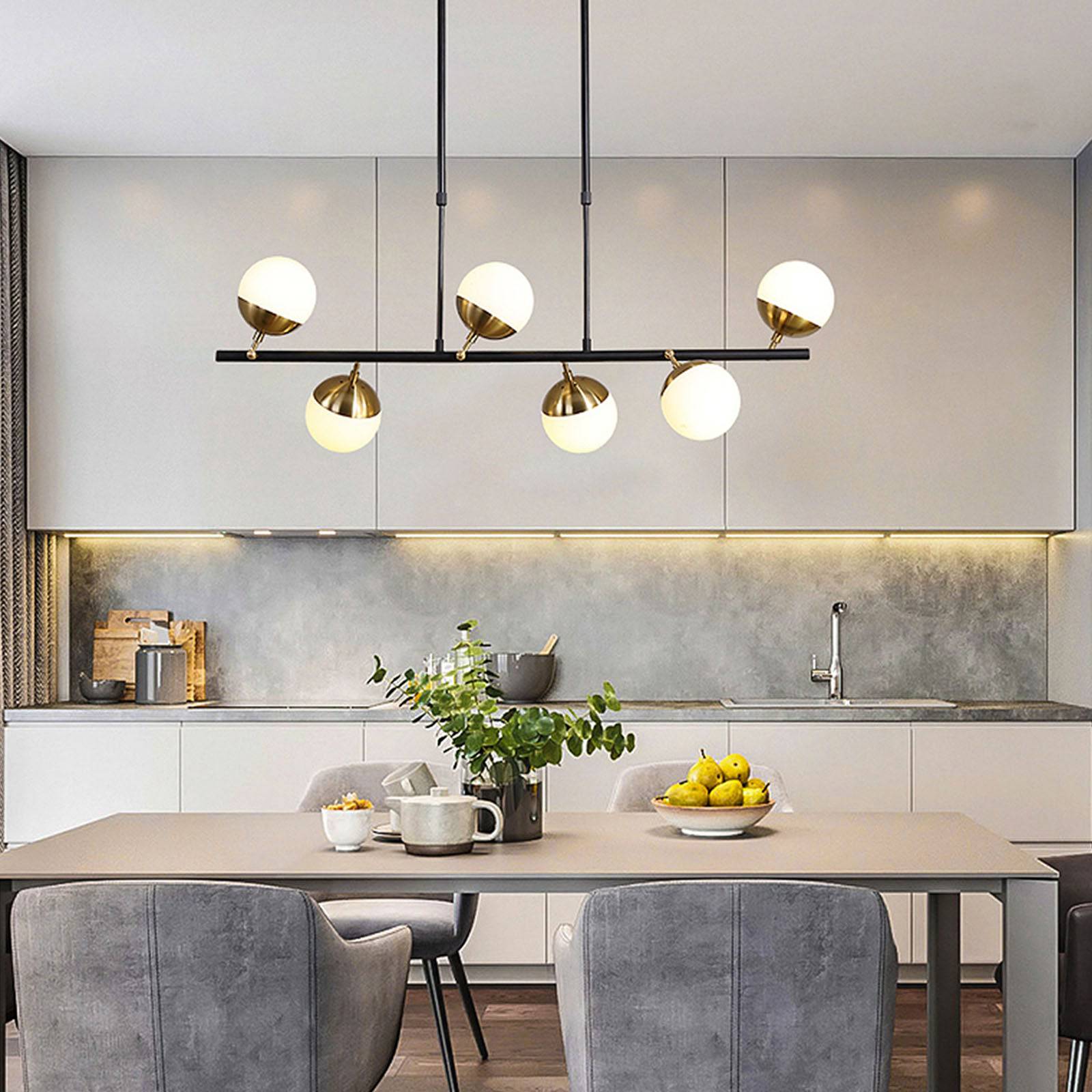 Display of the Arvika 6 Heads Pendant Lamp by BEACON, showcasing its modern design with six hanging light fixtures.