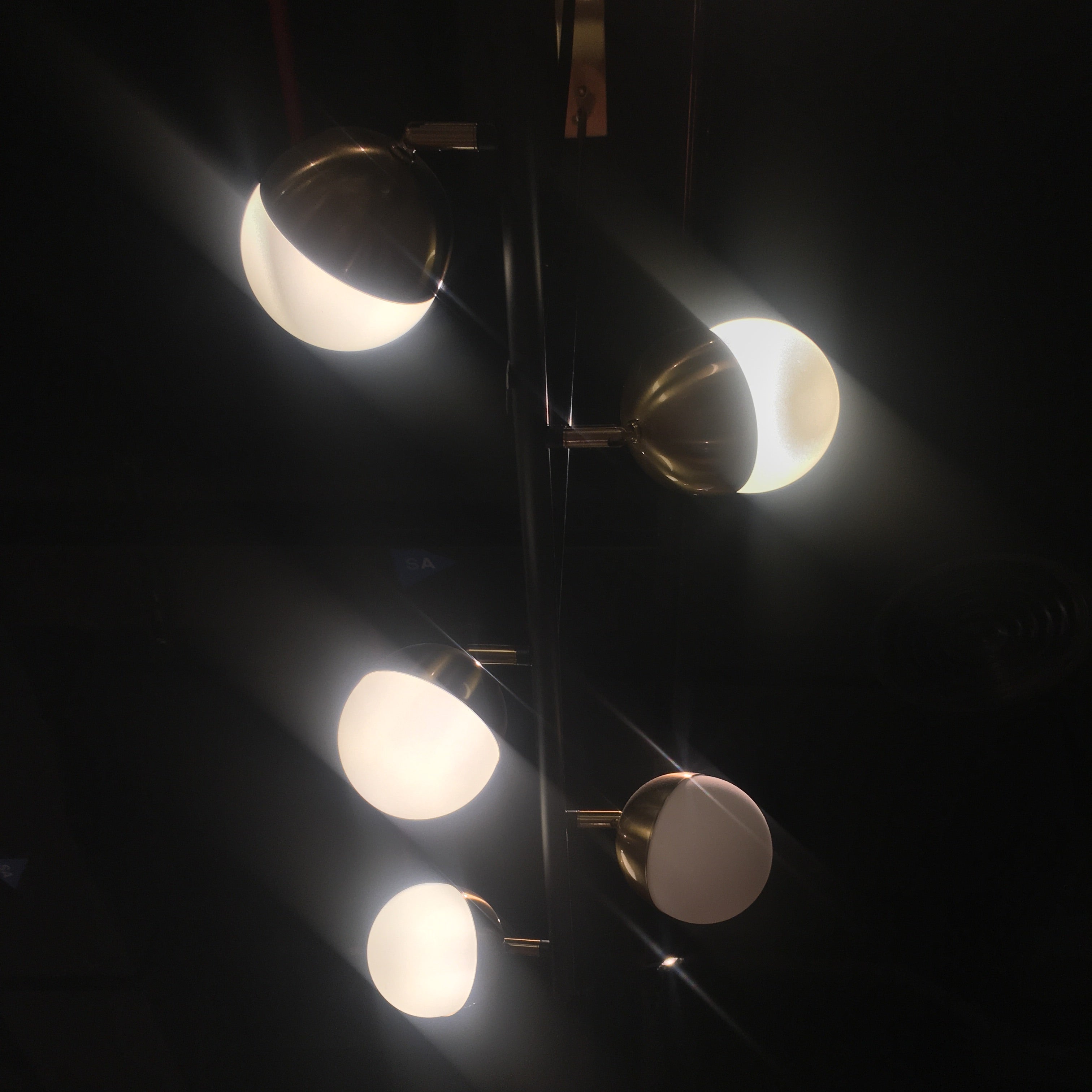 Display of Arvika 6 Heads Pendant Lamp by BEACON, showcasing modern pendant light with multiple hanging heads.