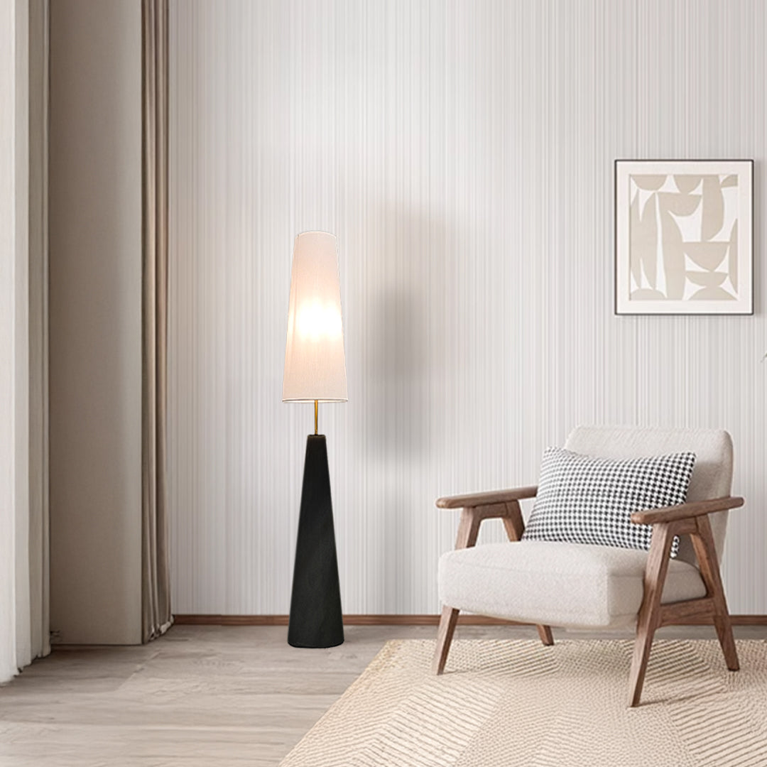 Black BEACON floor lamp CY-LTD-1008-B with a sleek design, standing tall on a modern surface in a well-lit room.