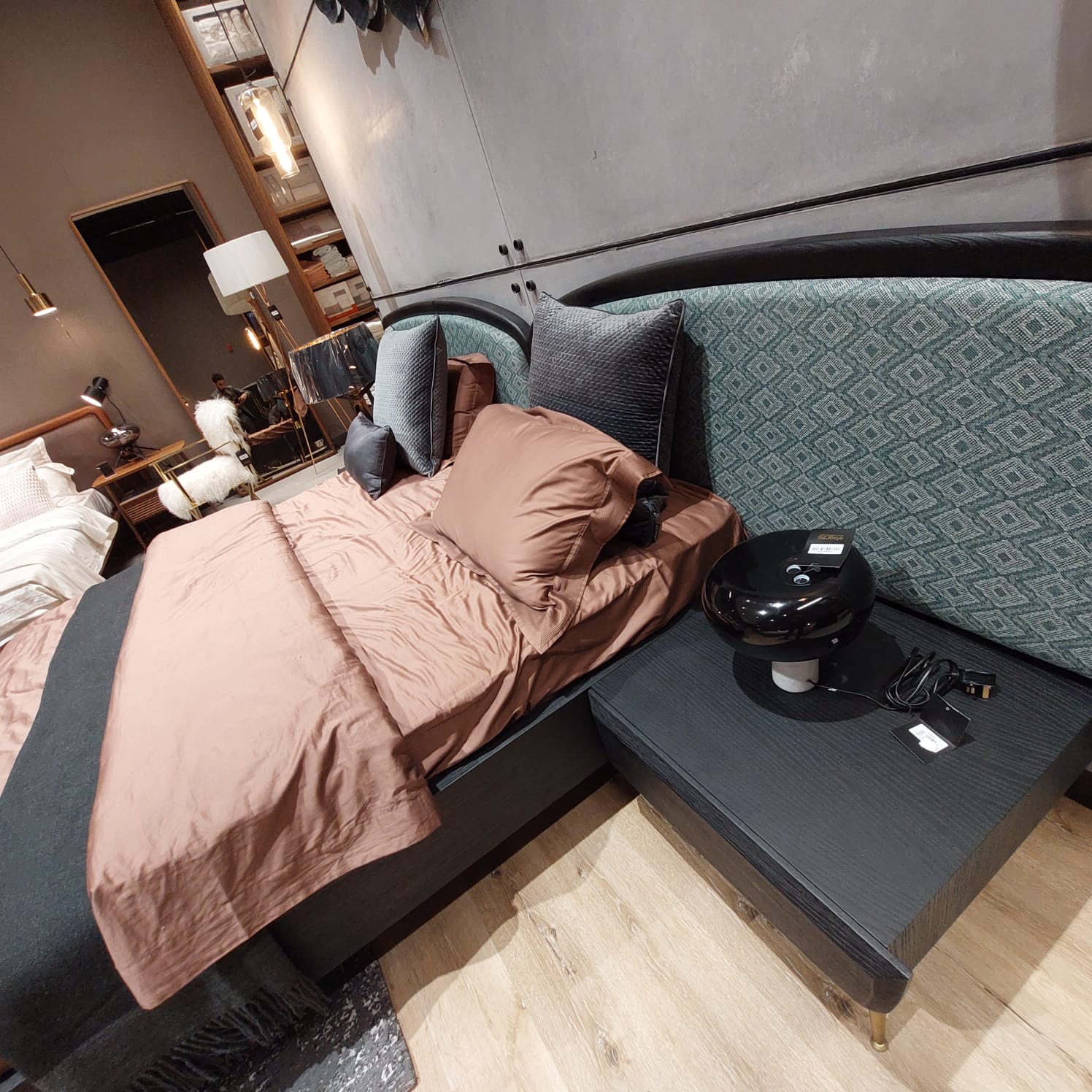 Display of Bug Bedstead with two matching nightstand tables by LODA FURNITURE, showcasing the bedroom furniture set.