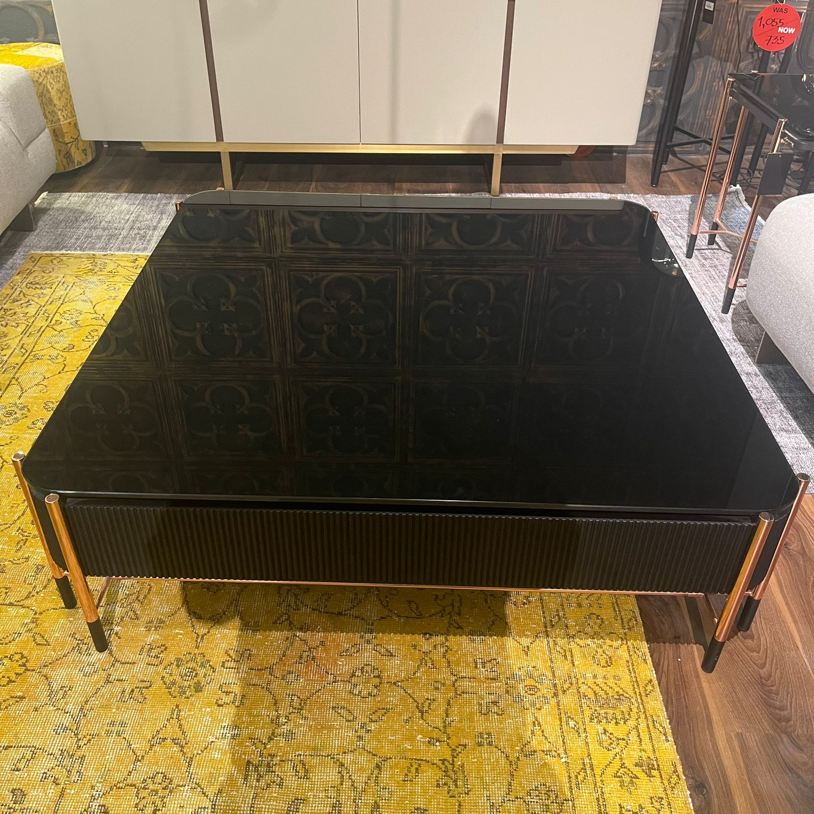 Display image of Dali Center Table with glass top by LODA FURNITURE, showcasing its modern design and clear glass surface.