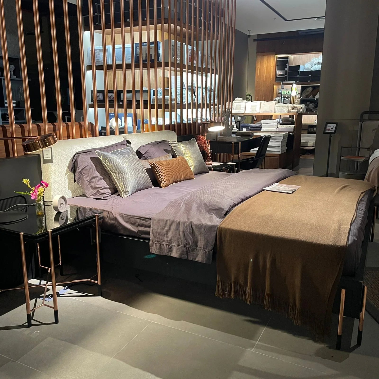 Display of the Dali King Size Bedstead by LODA FURNITURE, showcasing the modern wooden bed frame with a sleek headboard.