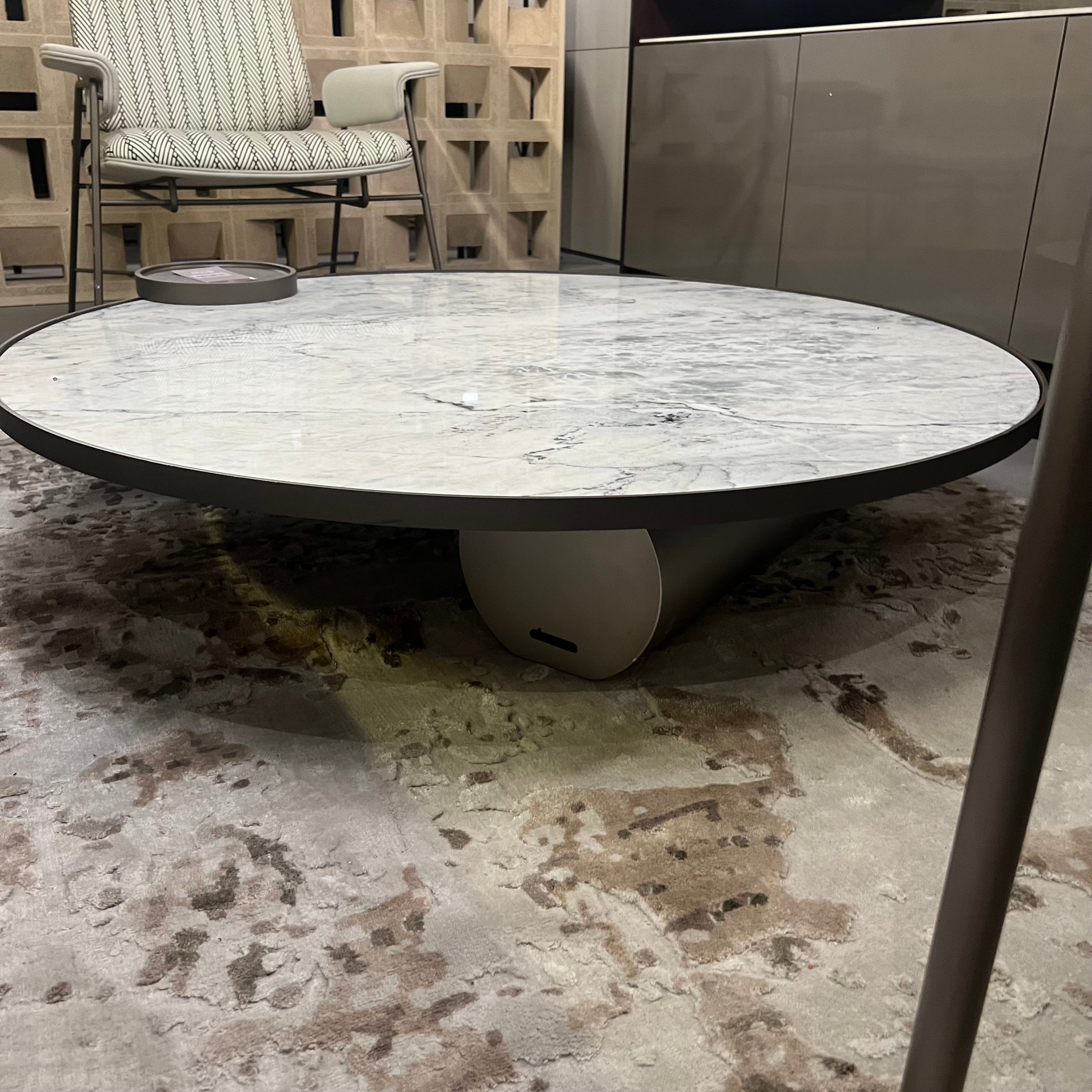 Desert marble coffee table by BEACON, modern display item with sleek surface and sturdy base, ideal for contemporary living rooms.