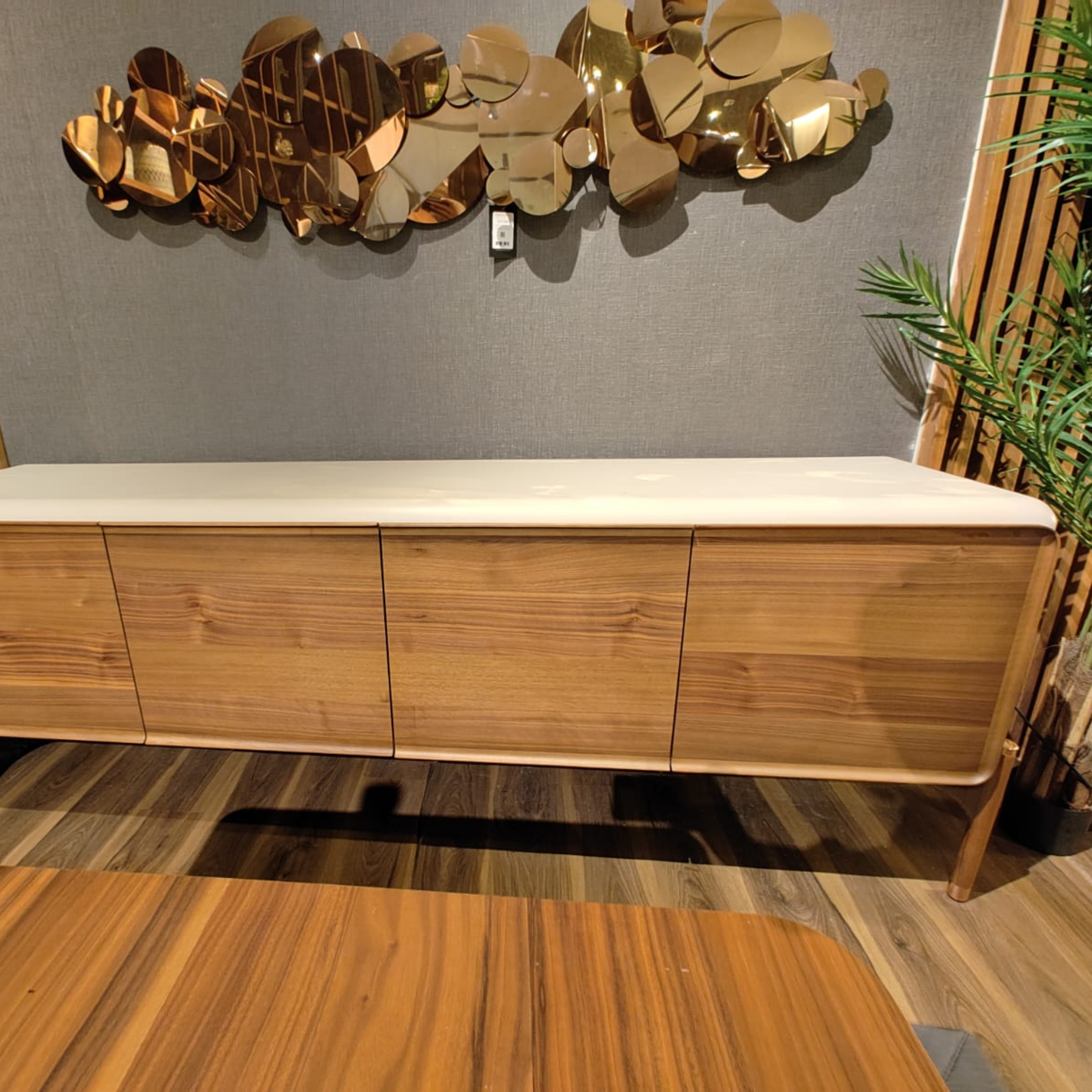 Elegant diamond-shaped sideboard by HOMAGE KOLTUK, showcasing sleek modern design with a polished surface and stylish storage.