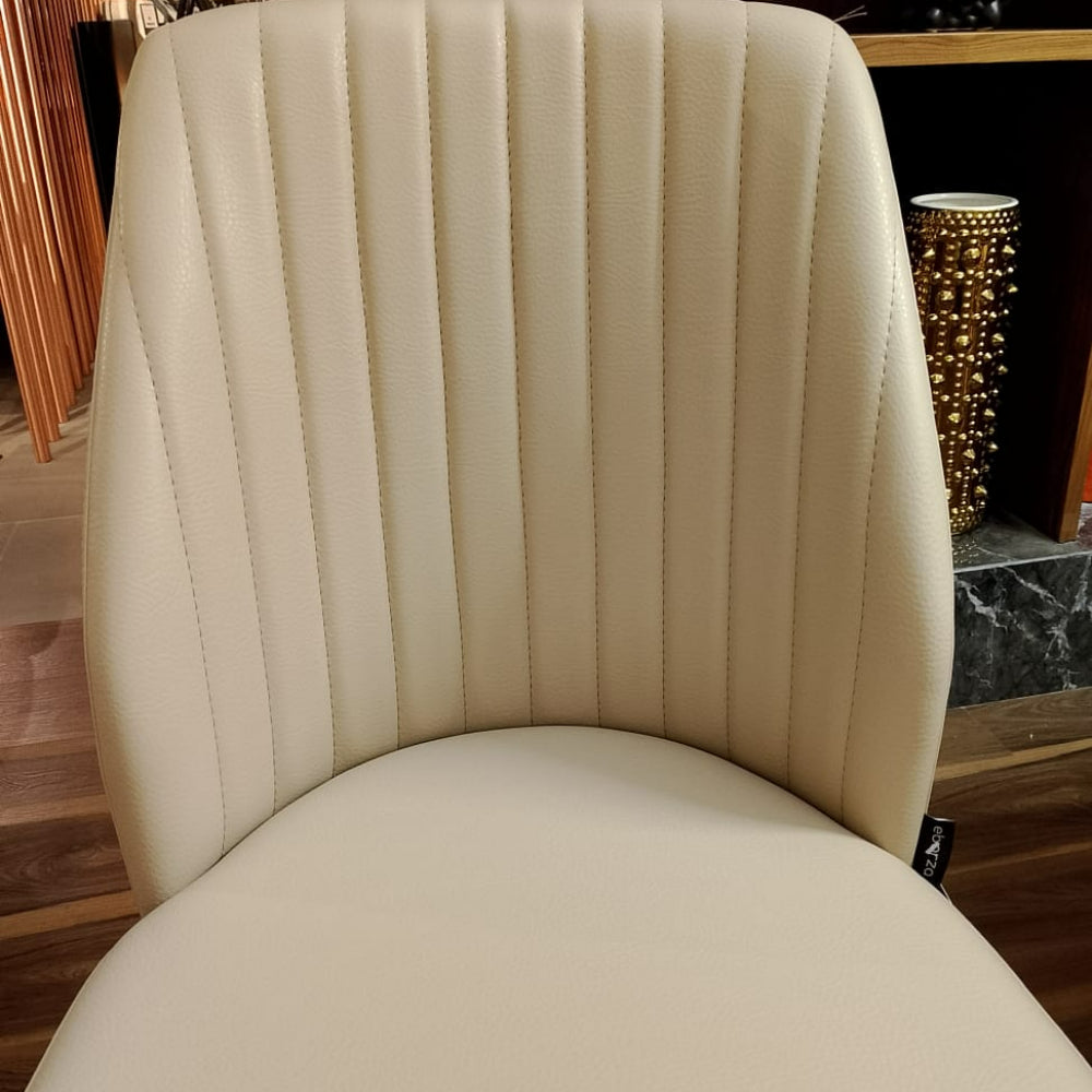 Display of Eco Nirvana Diva solid ash wood chair by OZZO, showcasing its sleek design and natural wood finish.