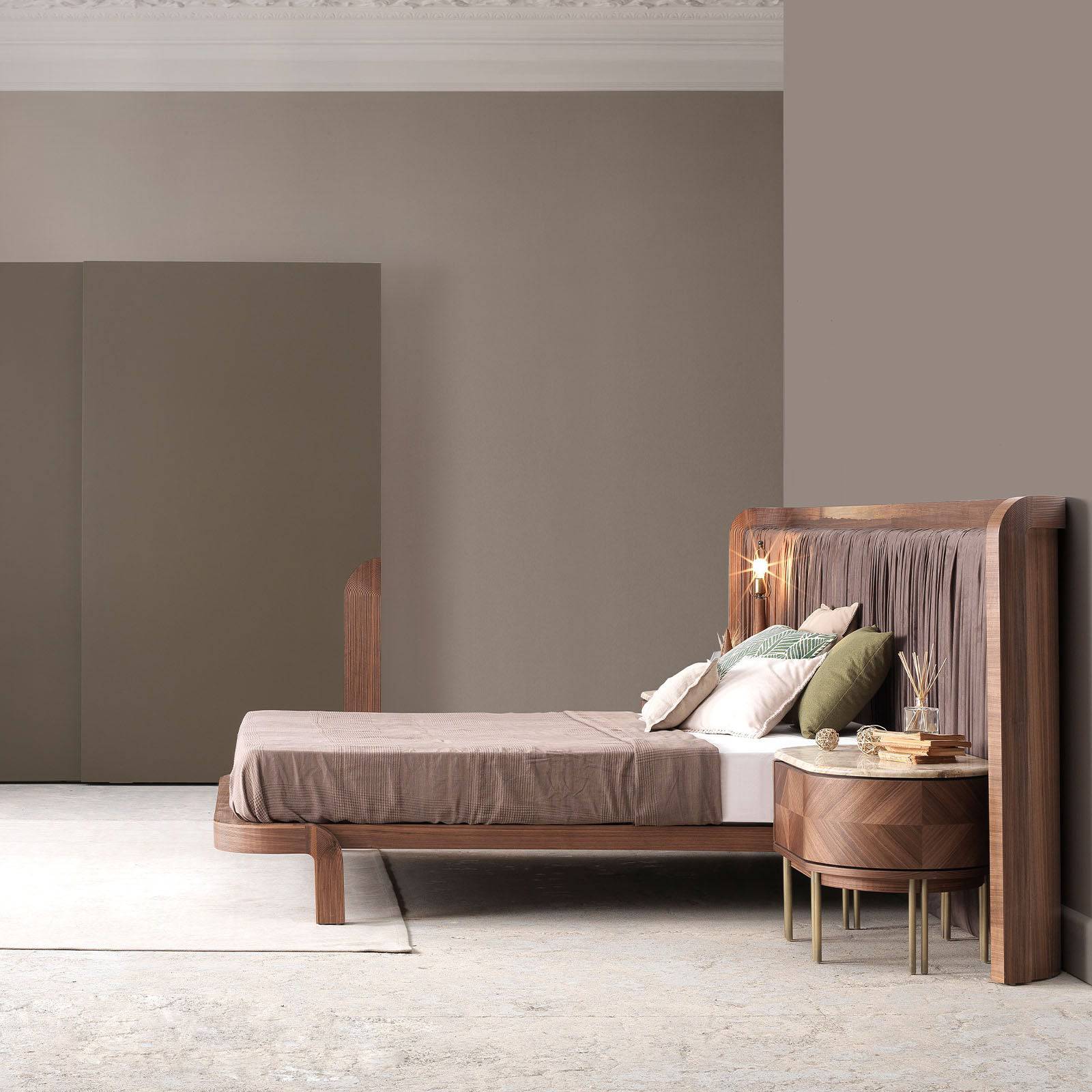 Display of the Eva King Size Bedstead by LODA Furniture, featuring a modern design with a sturdy wooden frame and elegant finish.