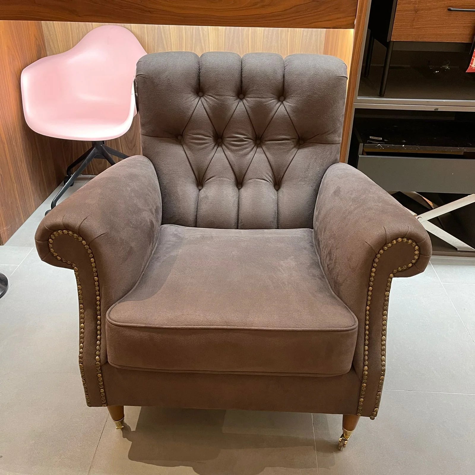 Fashion armchair display model by NDESIGN, showcasing a modern, stylish chair with plush upholstery and sleek design.