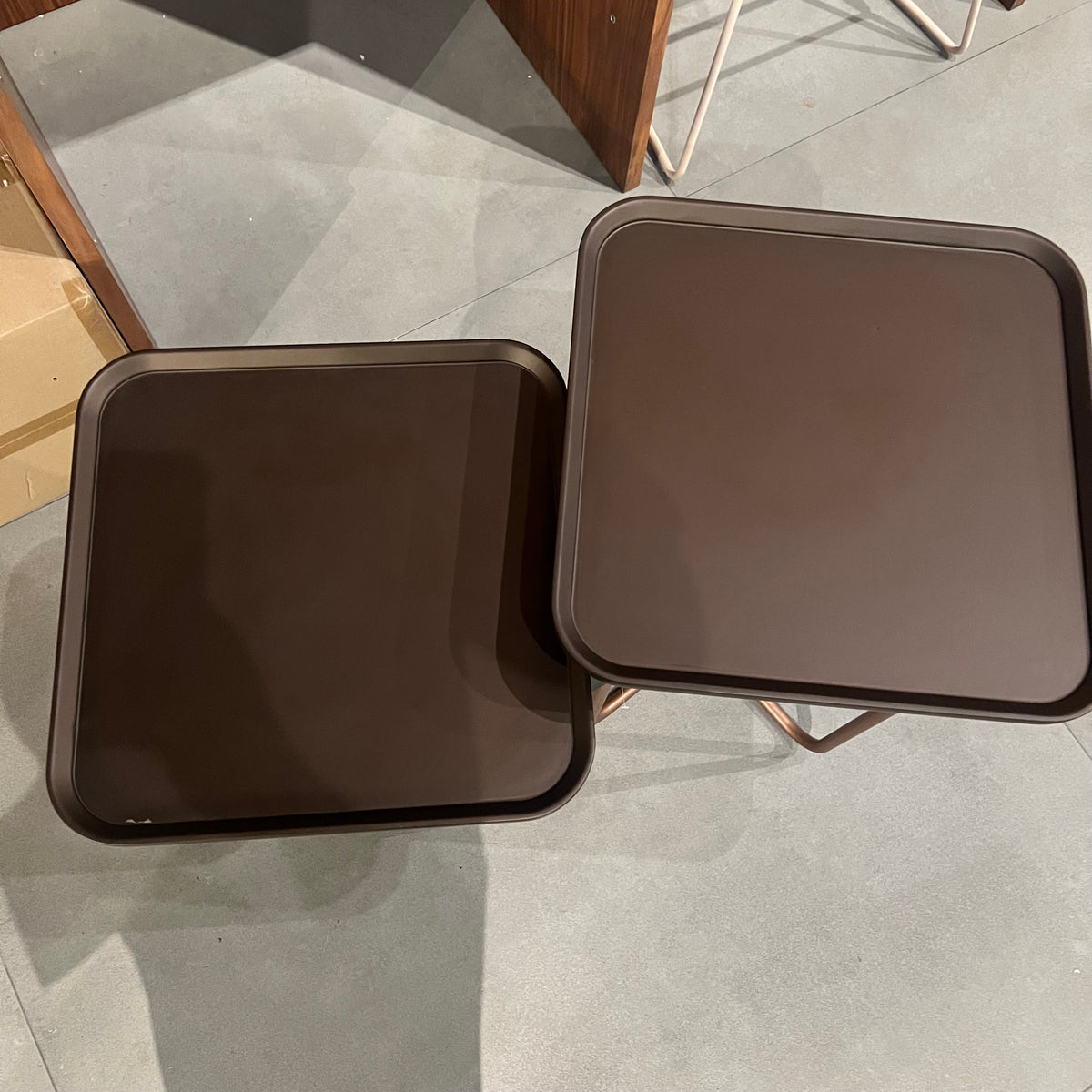 Set of two Firenze display tables by TOGO HOME STYLE with sleek design, featuring a modern, minimalist look in a neutral finish.