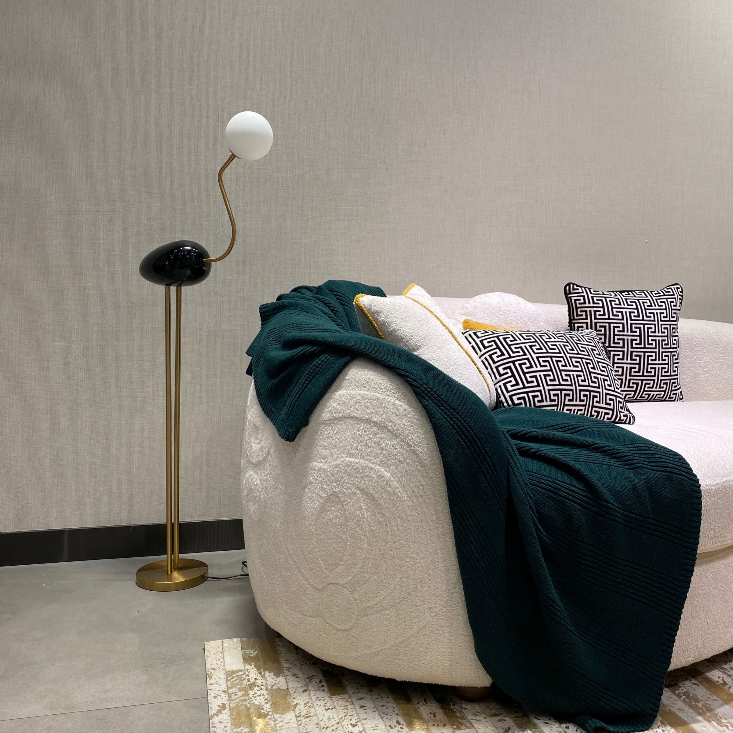 Black Flamingo Floor Lamp by BEACON, featuring a sleek, modern design with a curved flamingo shape for stylish home lighting.