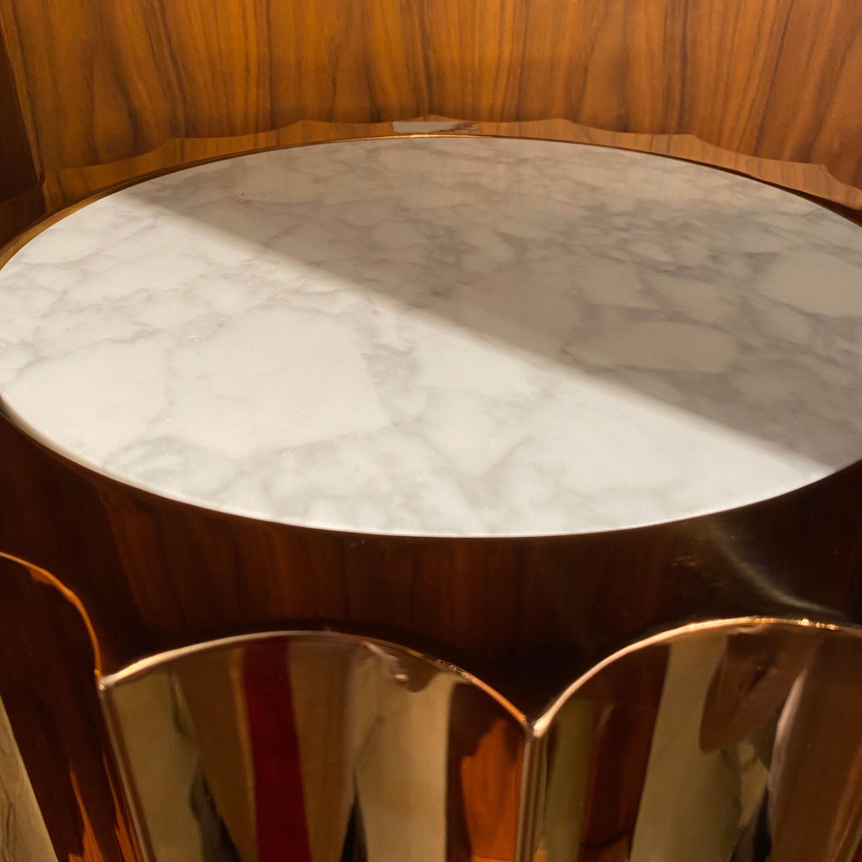Forlì natural marble side table by Beacon, showcasing a sleek round design with polished marble surface and modern style.