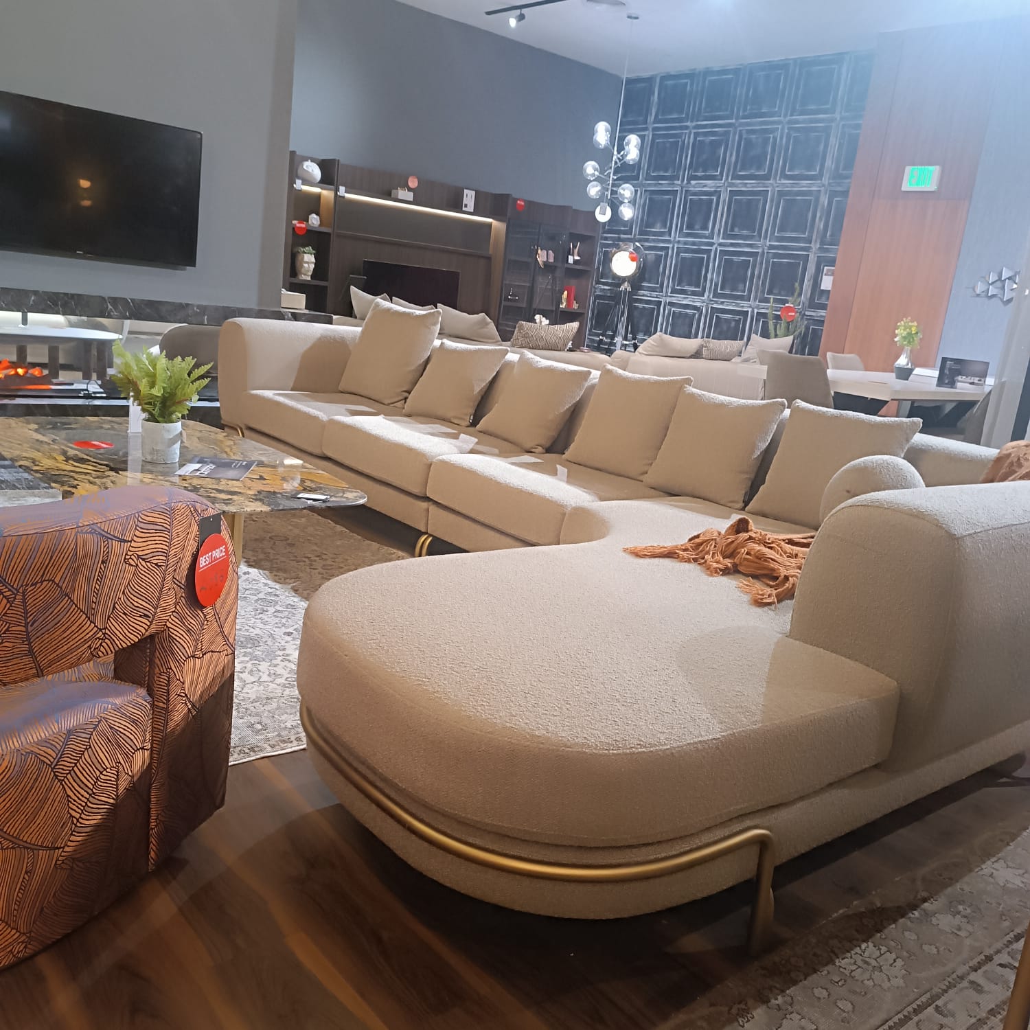 Display of Giallo L Shape Sofa by LODA Furniture, featuring vibrant yellow upholstery and modern design.