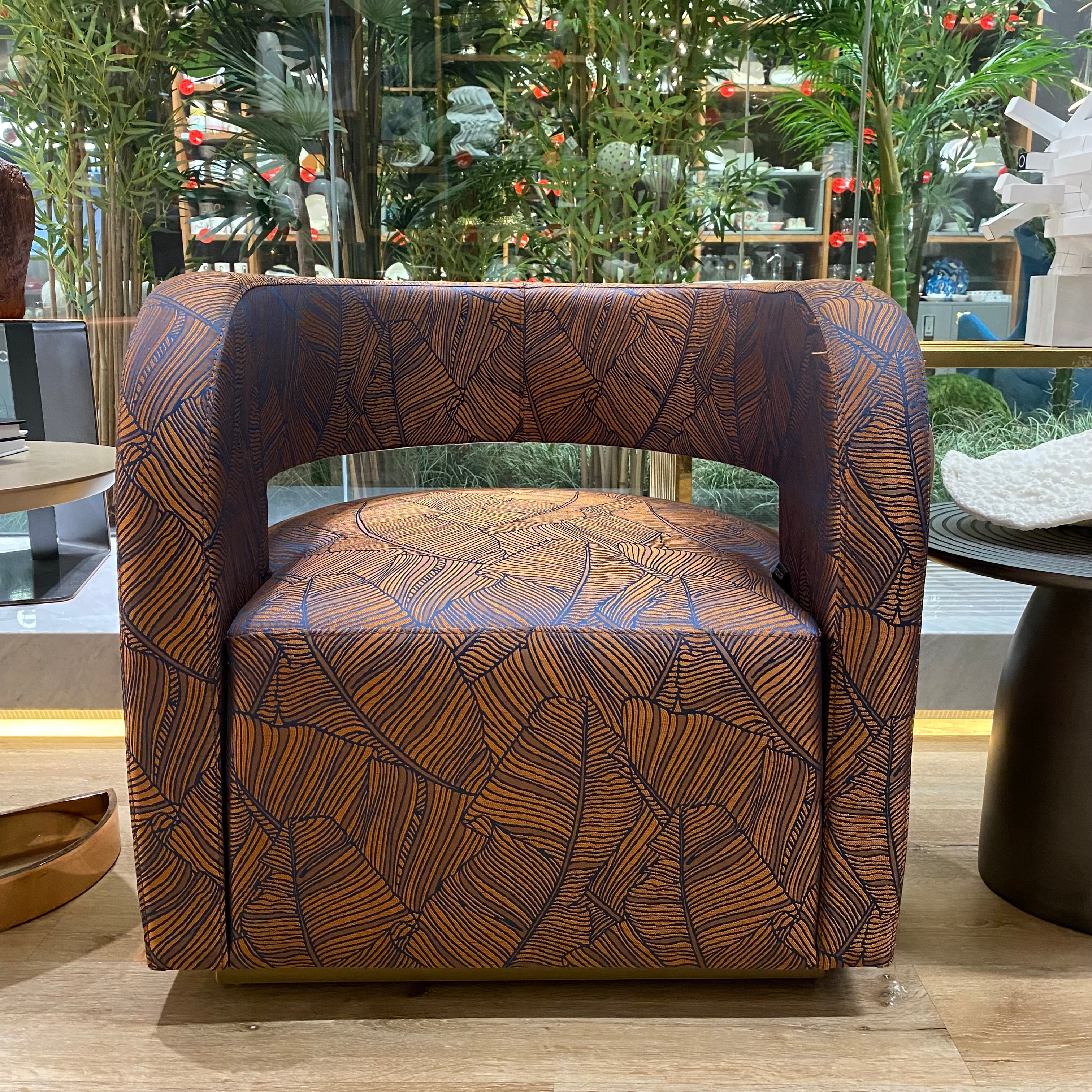 Display of the Gilles Lounge Chair by LODA Furniture, showcasing its modern design and comfortable seating.