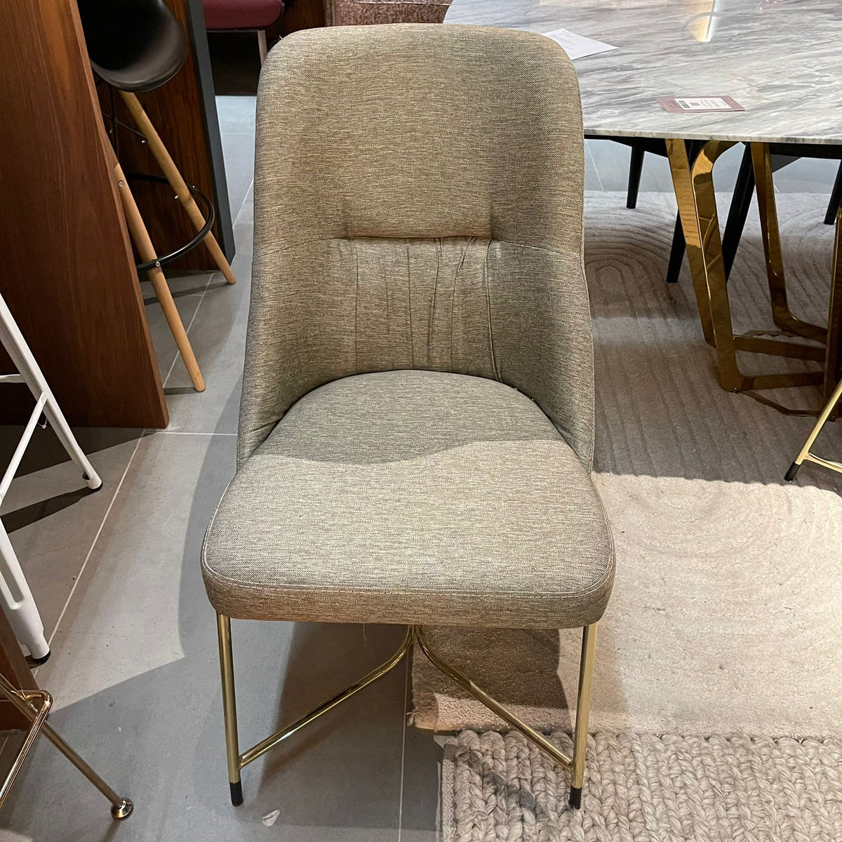 Grey YOL LIVING Diva015 dining chair display item with sleek modern design and cushioned seat.