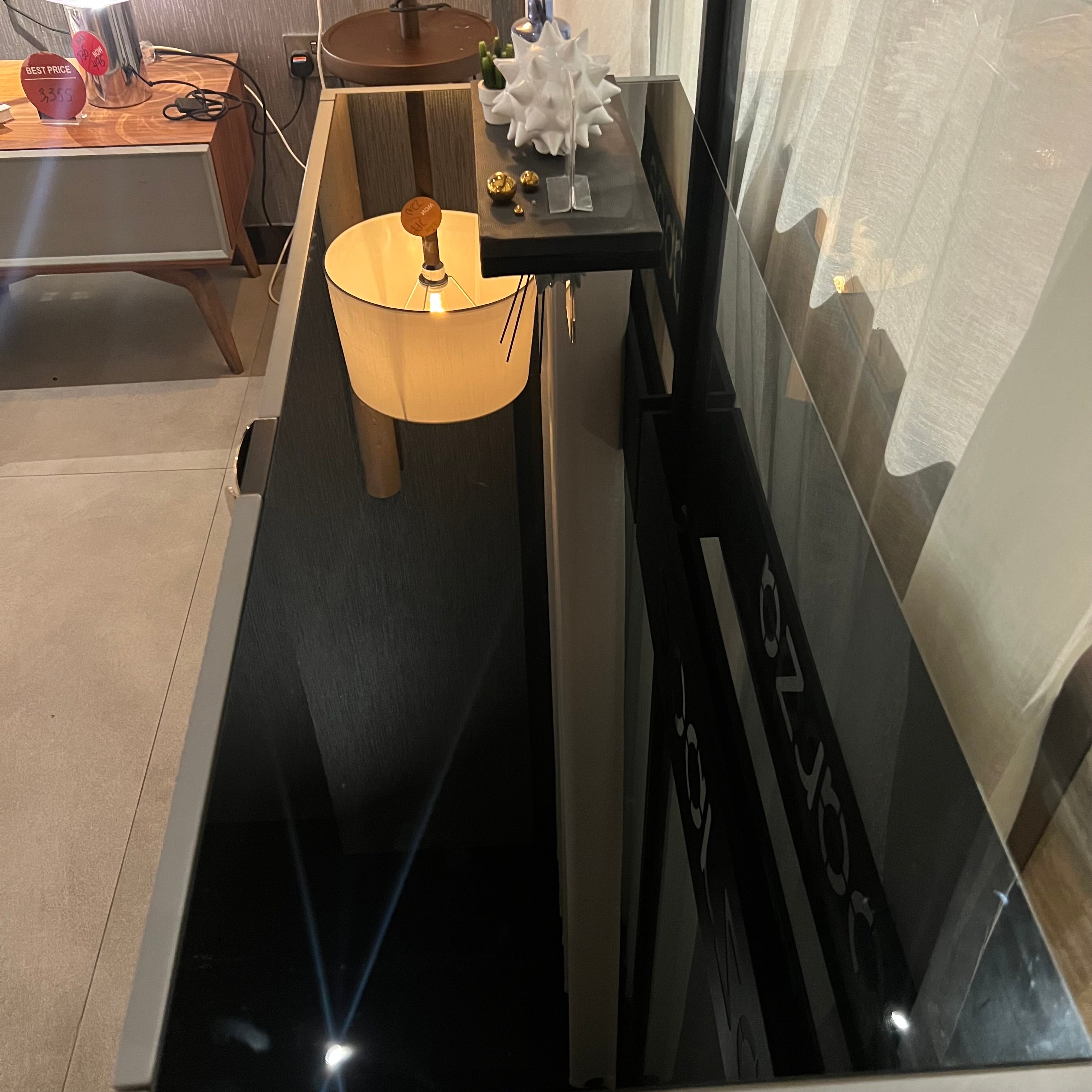Grey dresser and mirror display item by YOL LIVING, featuring a modern dresser with matching mirror in a sleek grey finish.