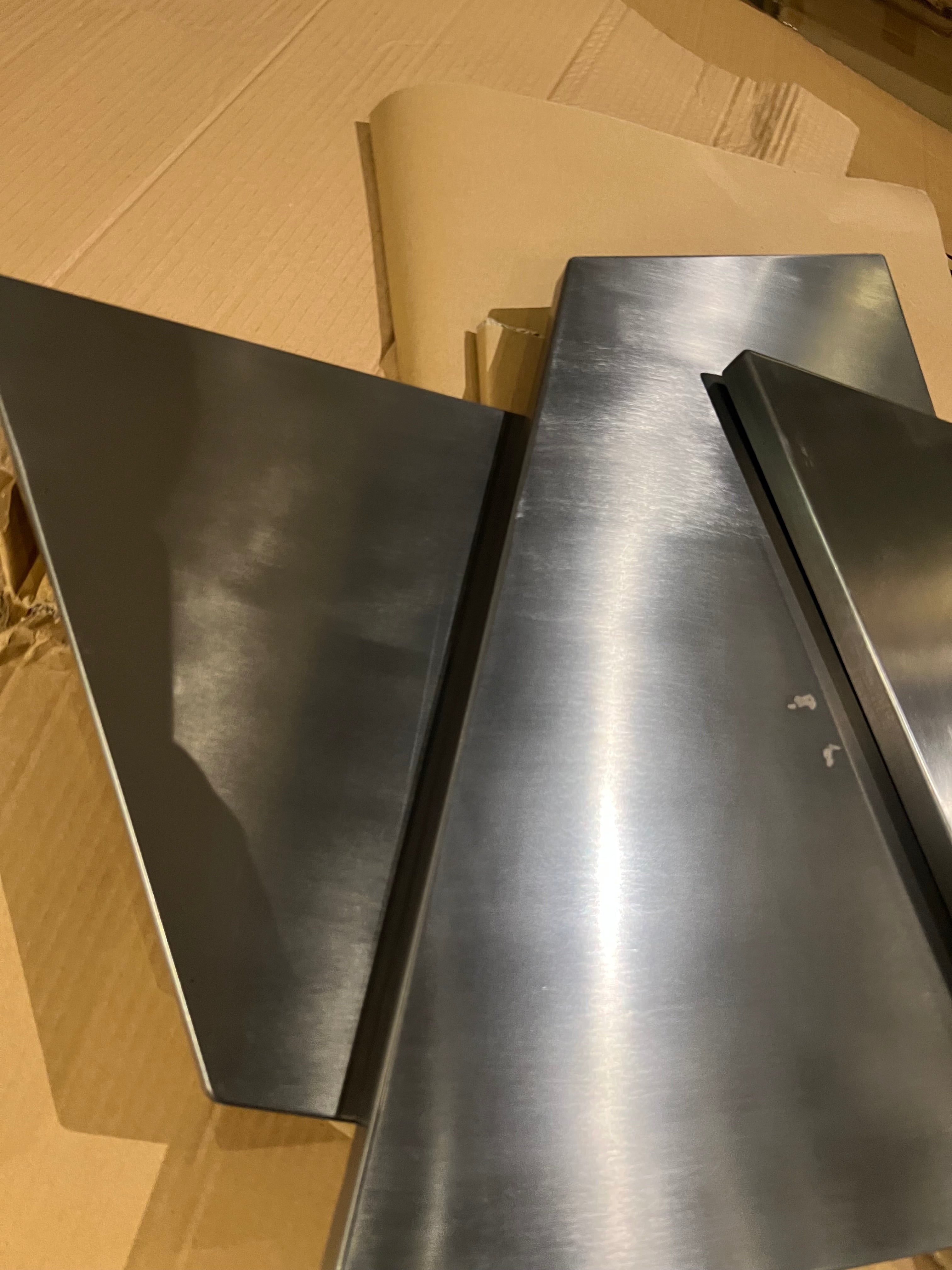 Hand-crafted stainless steel artwork display item featuring the Nakheel design by Beacon, showcasing intricate metal craftsmanship.
