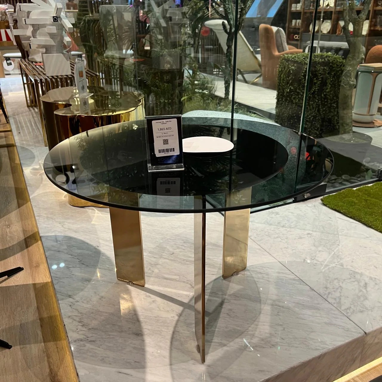 Heritage side table by SALONI, modern design with wooden finish, displayed as a stylish home decor piece.