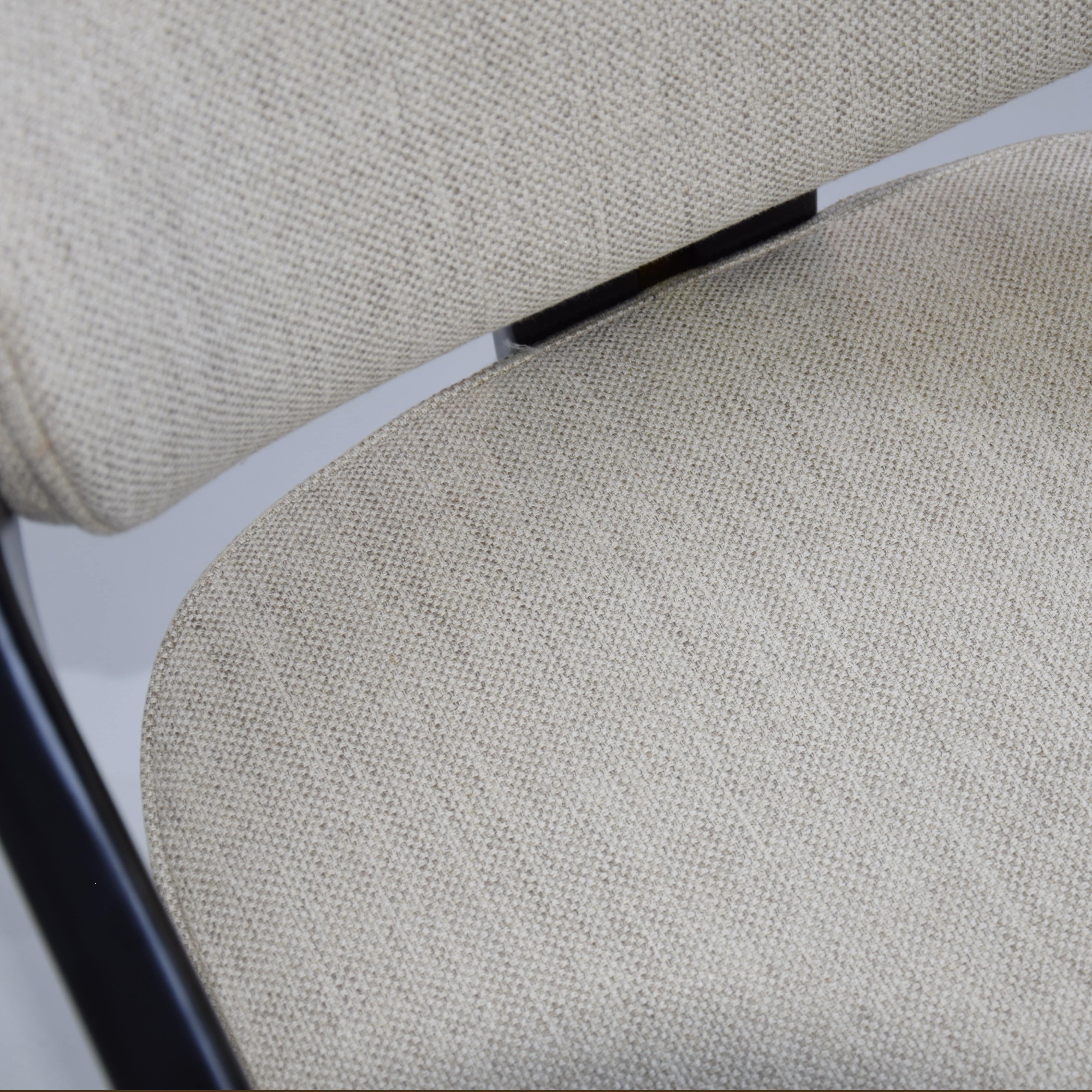 Display of the Sancrea Kotor Chair Notte in Cosmic11 fabric, showcasing its modern design and plush upholstery.