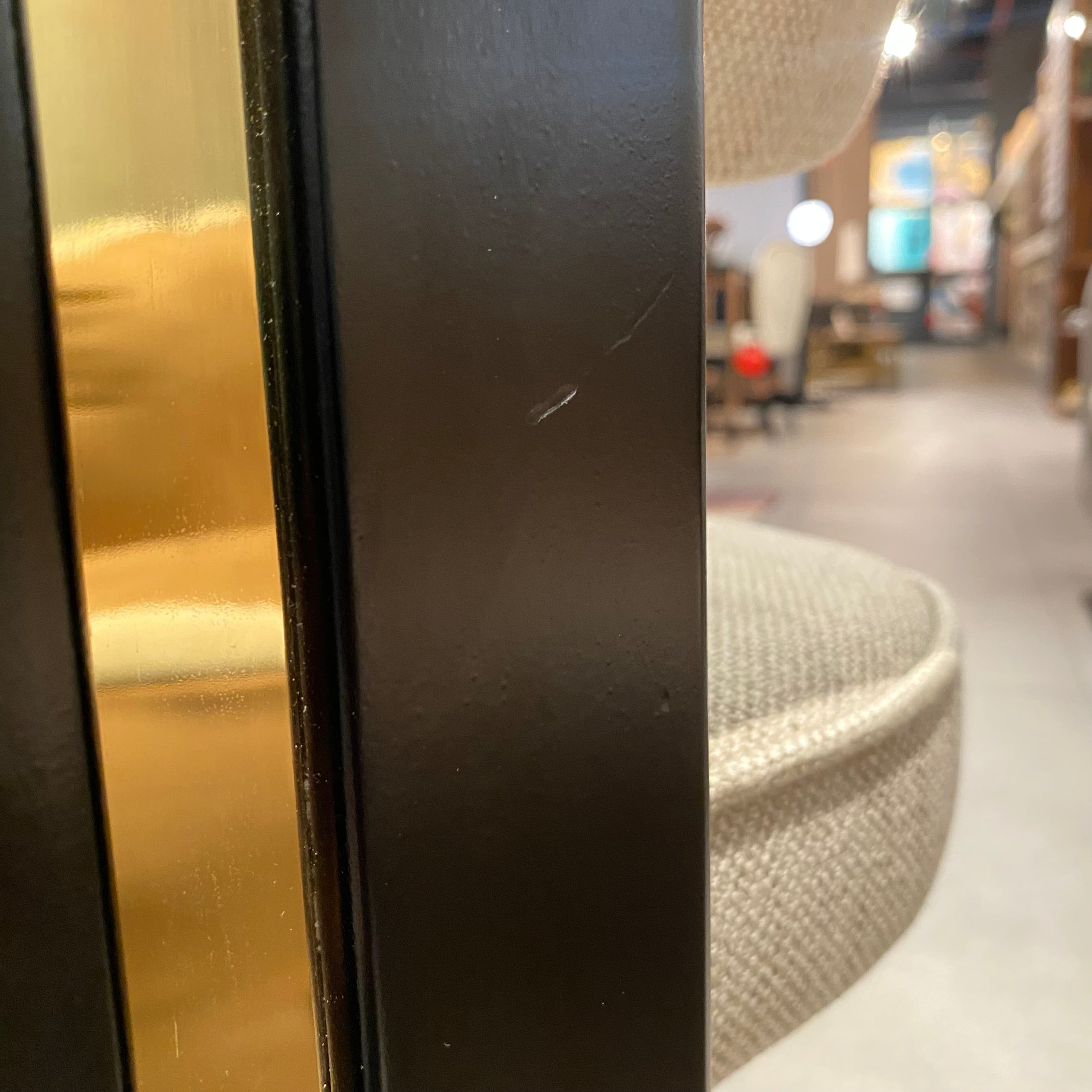 Display of the SANCREA Kotor Chair in Notte fabric, showcasing its modern design and sleek black finish.