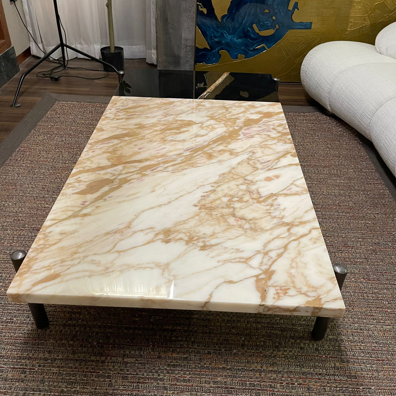 Black and gold Lauren coffee table display item with sleek design, showcasing modern style and high-quality finish.
