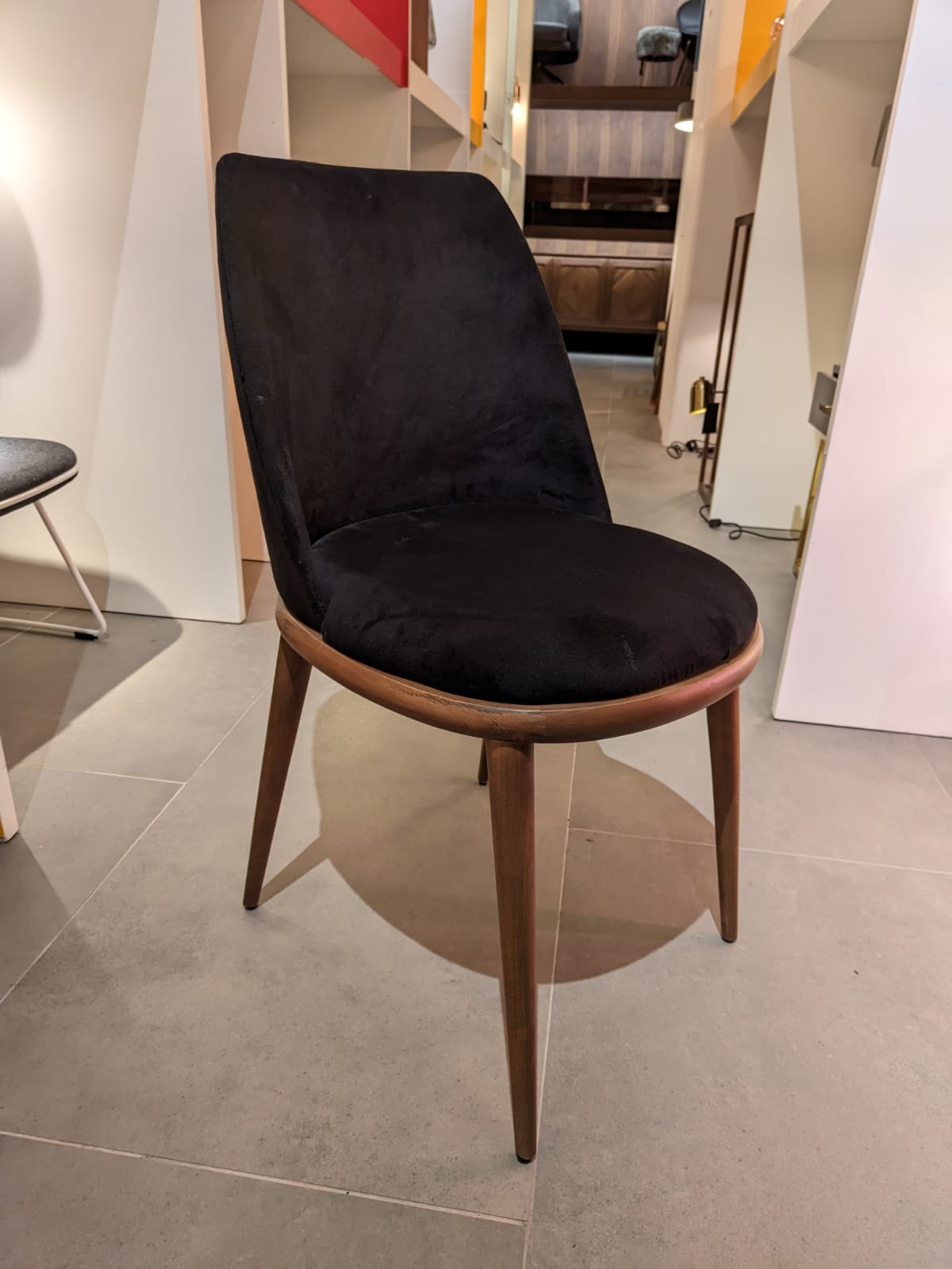 Display image of Luna Dining Chair by YOL LIVING, showcasing a modern, stylish chair with a sleek design and neutral upholstery.