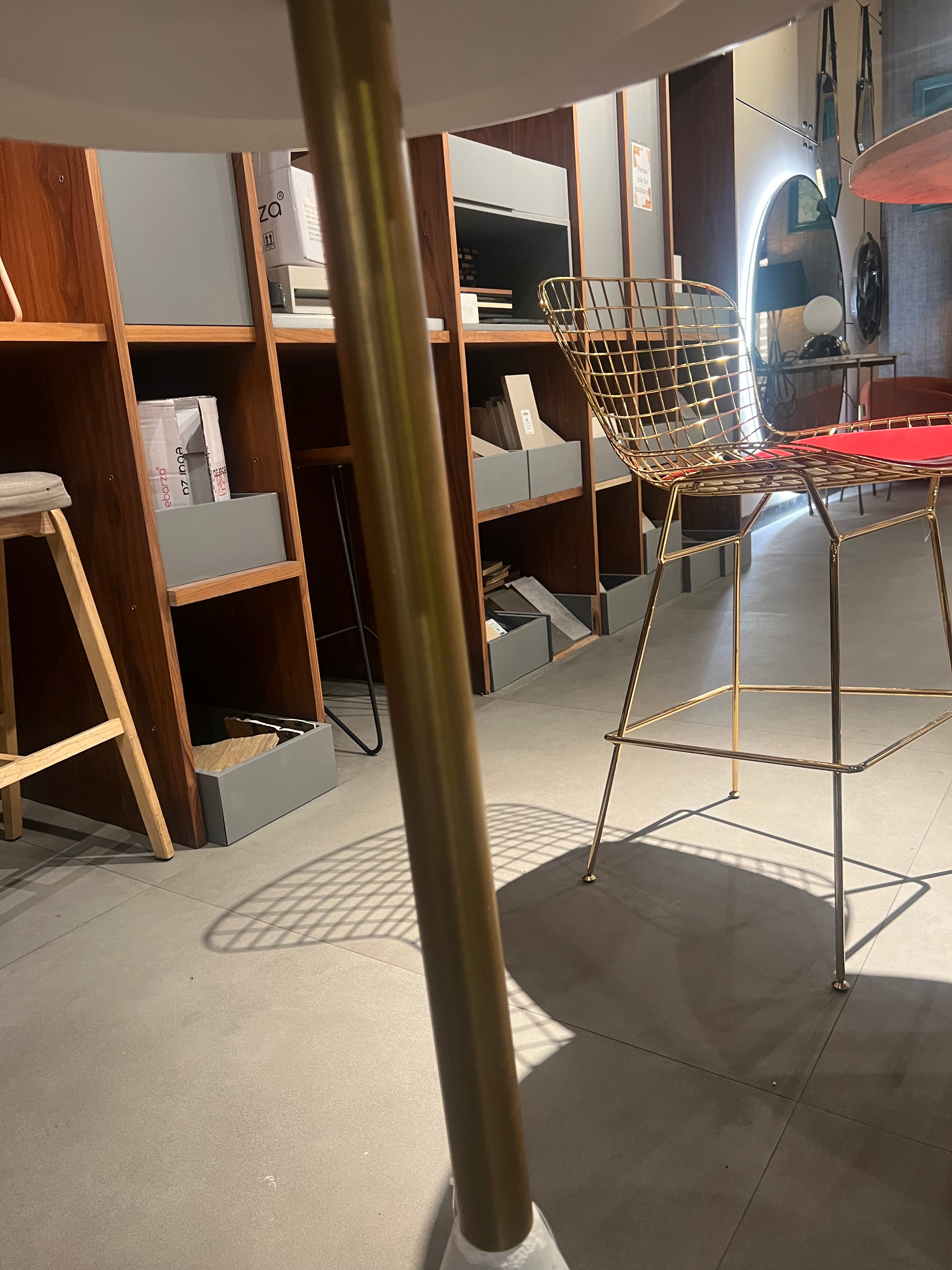 Display item showing a Madrid natural marble bar table by Beacon, featuring a sleek marble surface and modern design.