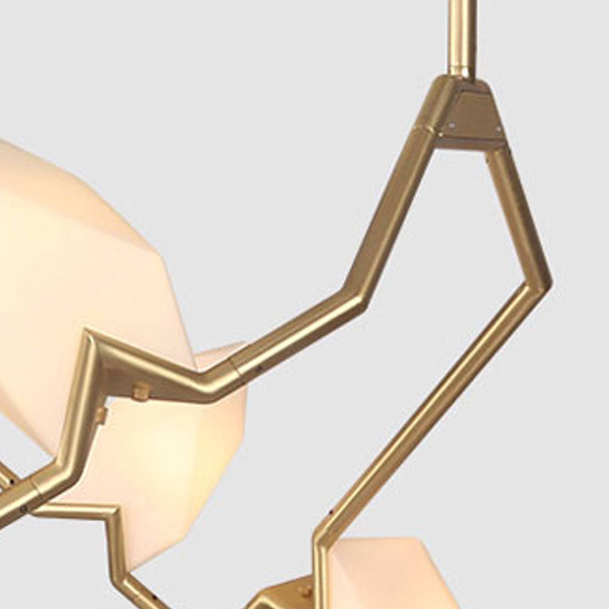 Display image of the Masko 12-heads chandelier by Beacon, showcasing its elegant design and intricate details.