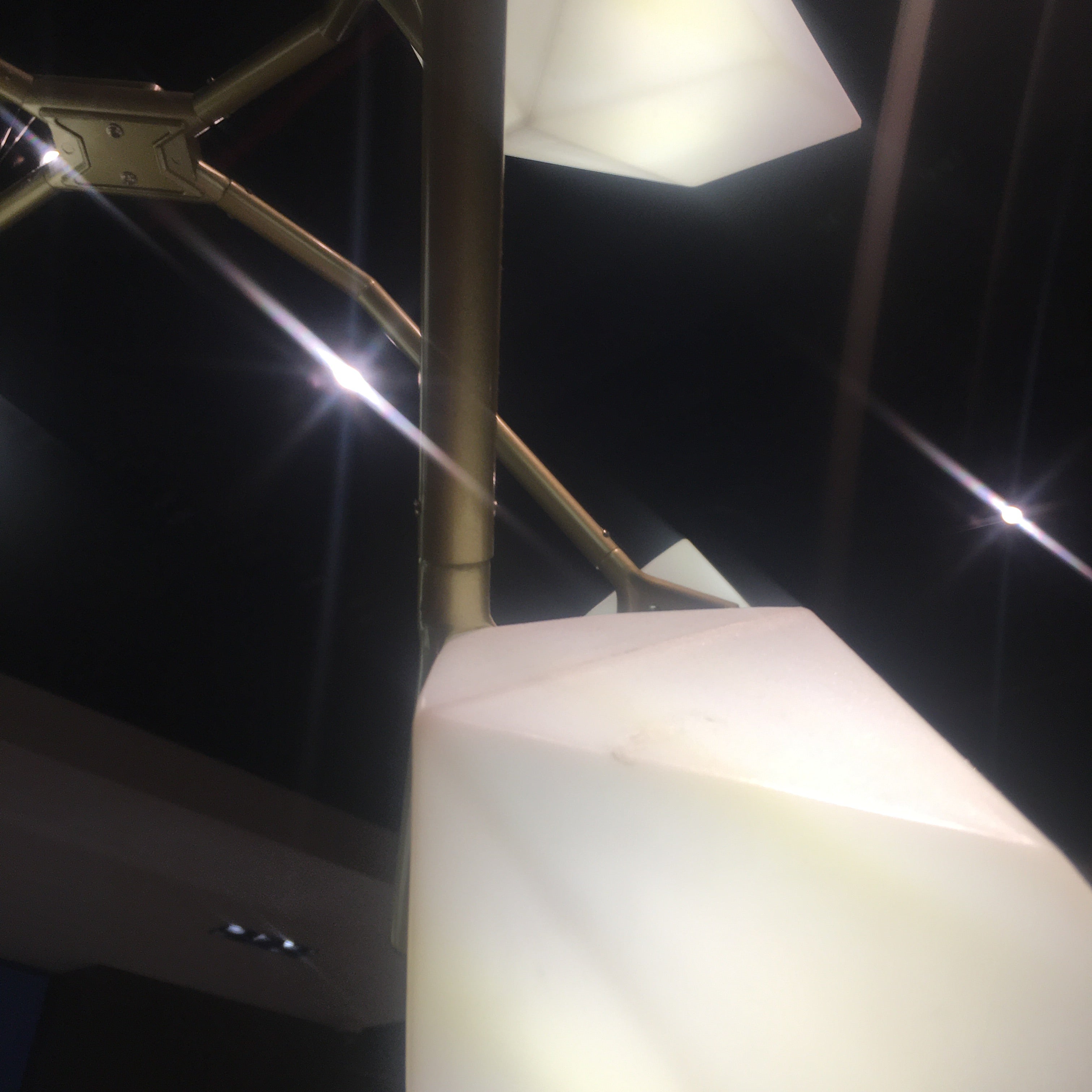 Display item of the Masko 12-heads chandelier by Beacon, featuring intricate design with multiple hanging light fixtures.