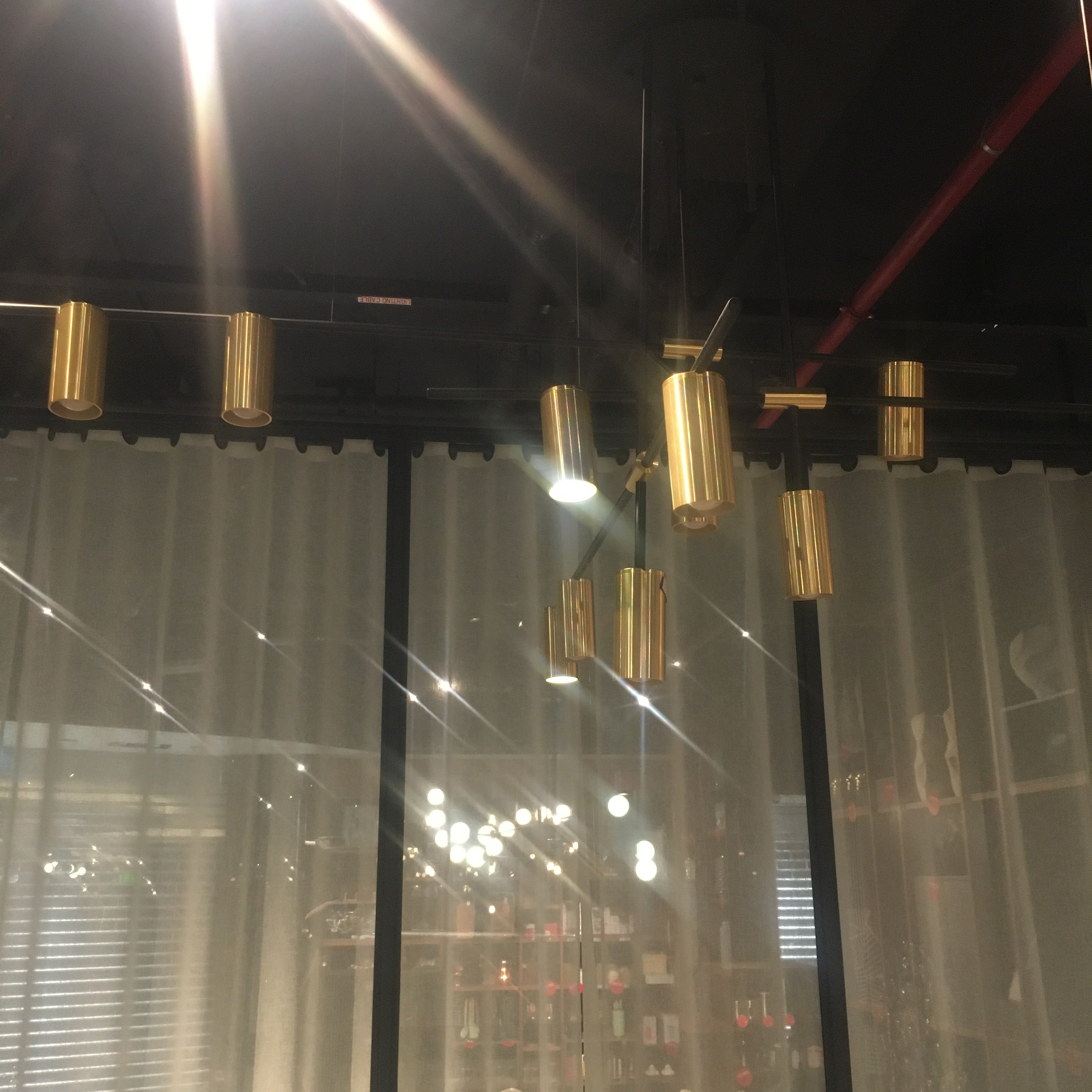 BEACON Monaco 12-heads pendant lamp with sleek design, hanging from ceiling, modern lighting fixture for stylish interior decor