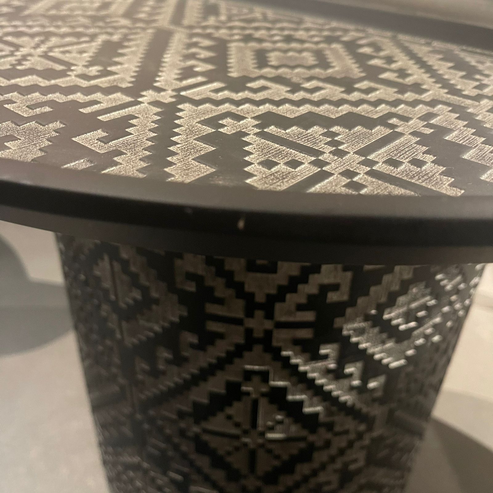 Nills Furniture Design Motif Side Table display item with a modern design, featuring a round wooden top and sleek metal legs.