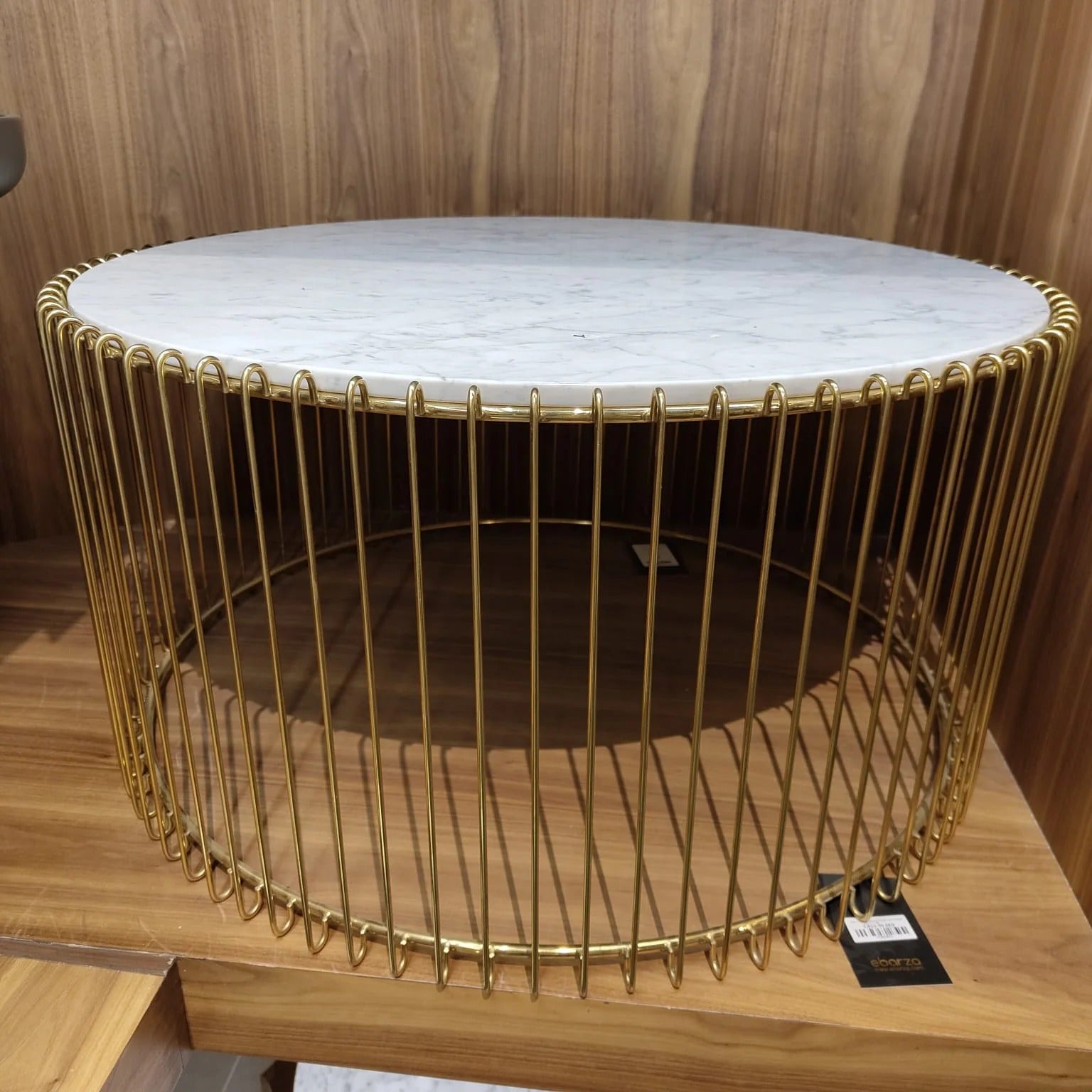 Natural marble and stainless steel display table by Beacon featuring a sleek, modern design with elegant marble surface and stainless steel frame.
