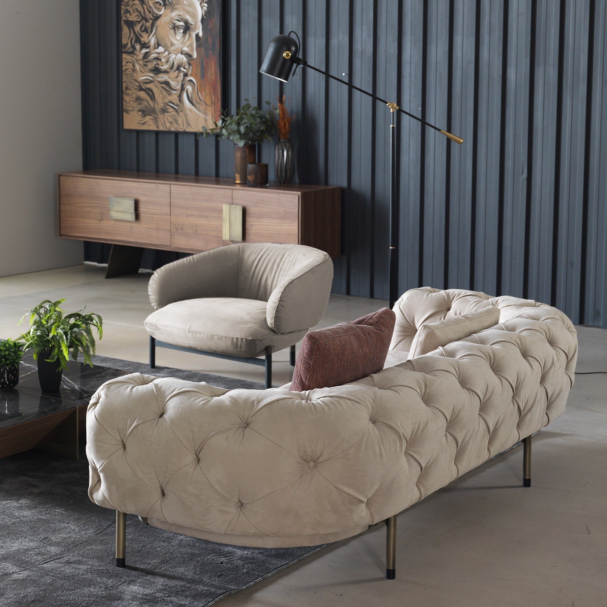 NextArmchair from HOMAGE KOLTUK, modern armchair display piece with sleek design and neutral upholstery.