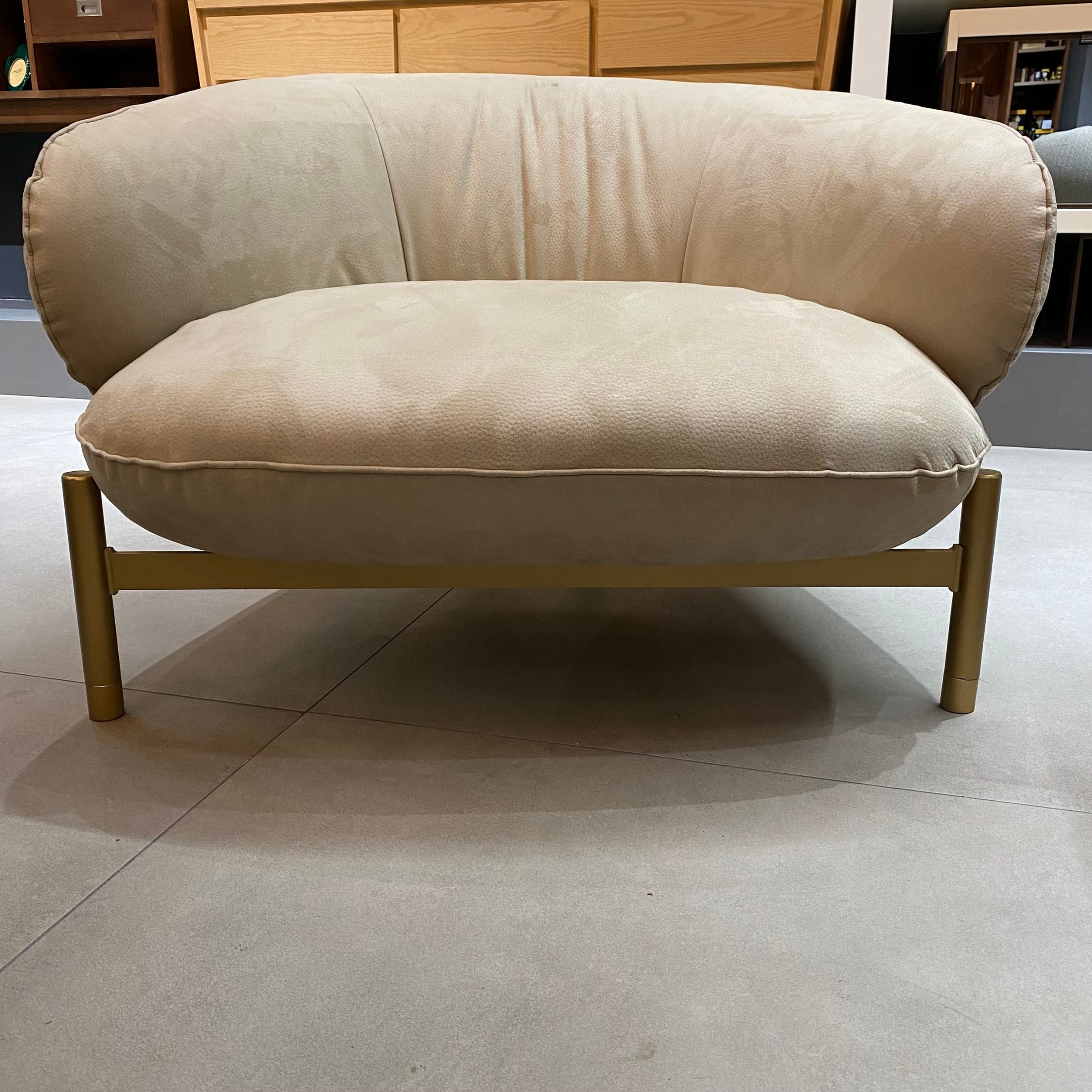 Next Armchair by HOMAGE KOLTUK, stylish display item with modern design, featuring plush upholstery and sleek armrests.