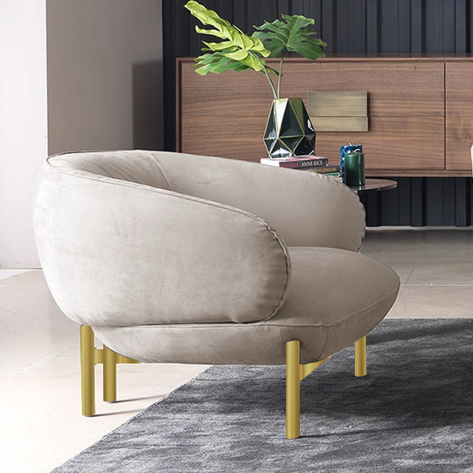 Display of the Next002 armchair by HOMAGE KOLTUK, showcasing its modern design and plush upholstery.