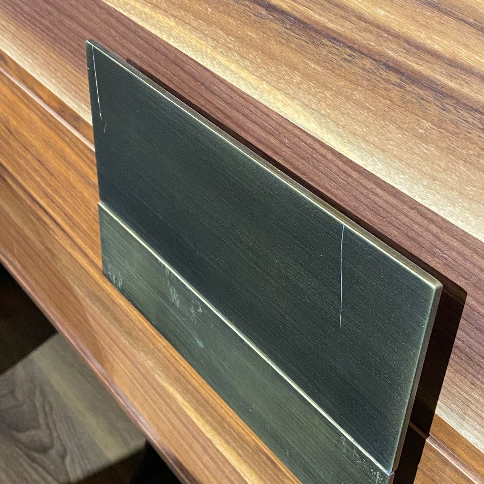 Display of the Next Side Board Next002YAS by Homage Koltuk, showcasing its modern wooden design and sleek finish.