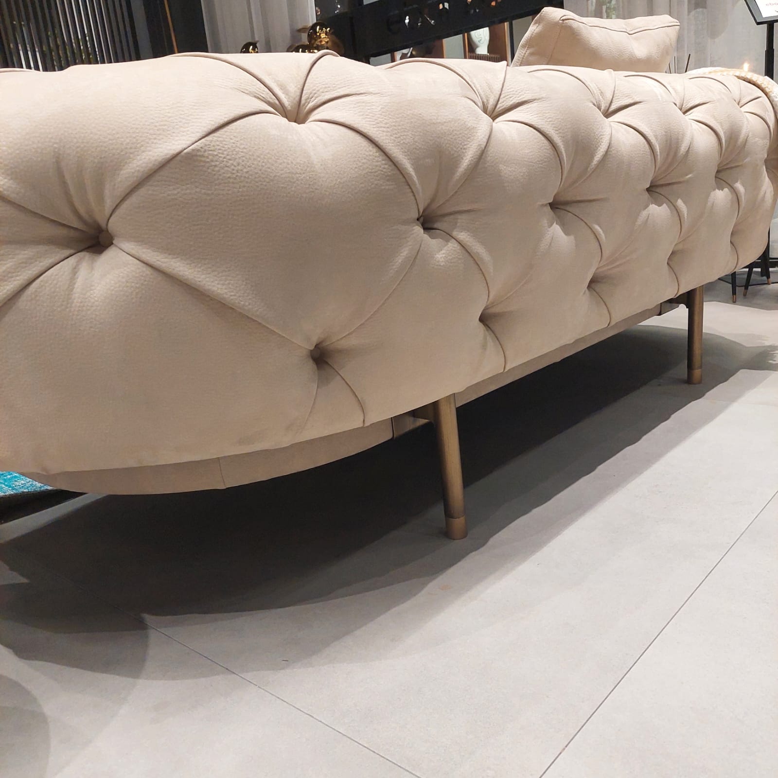 HOMAGE KOLTUK Next002 sofa display item, modern beige fabric sofa with sleek design, showcasing living room furniture.
