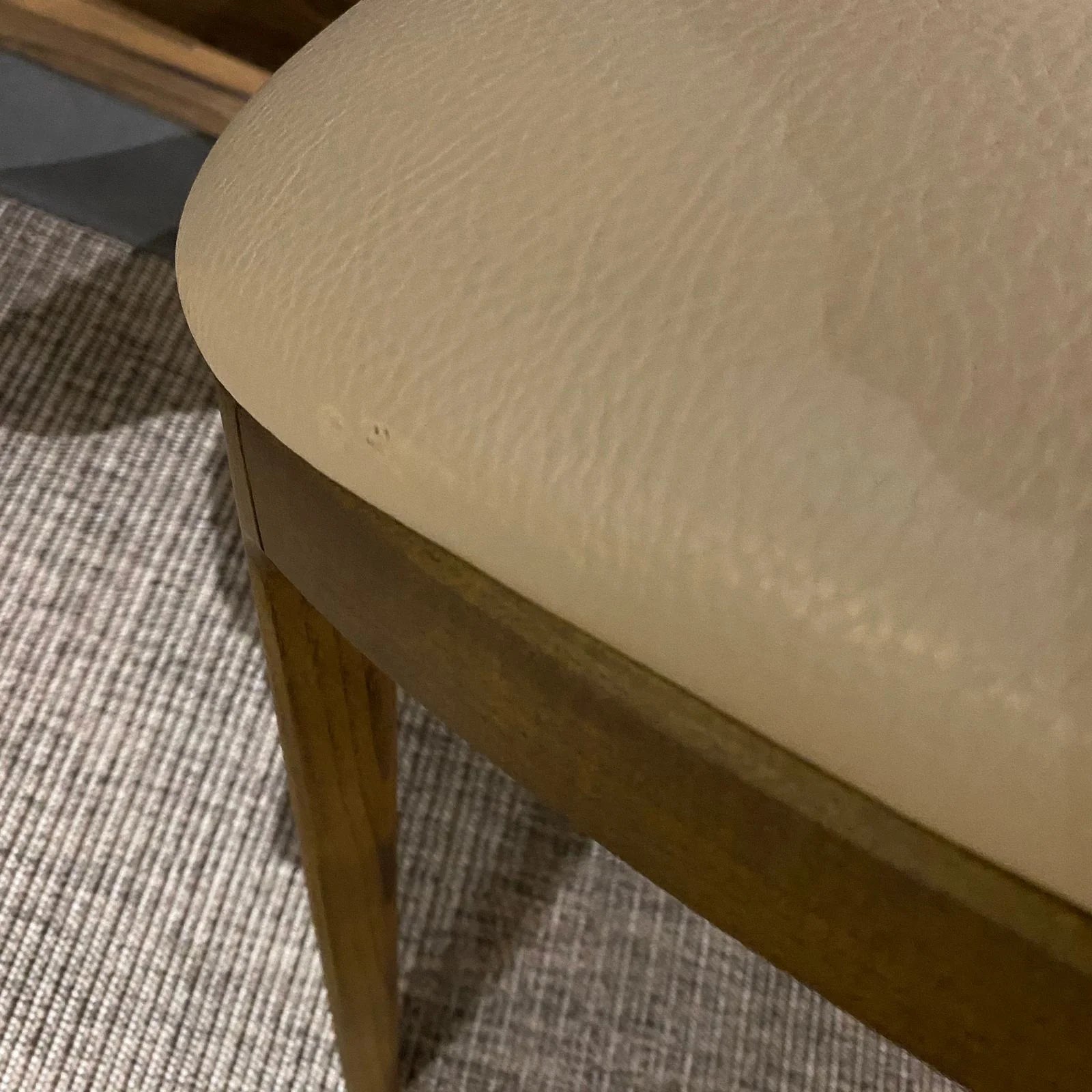 OZZO Nirvana solid ash wood chair without arms, showcasing a sleek modern design with smooth finish and ergonomic shape.