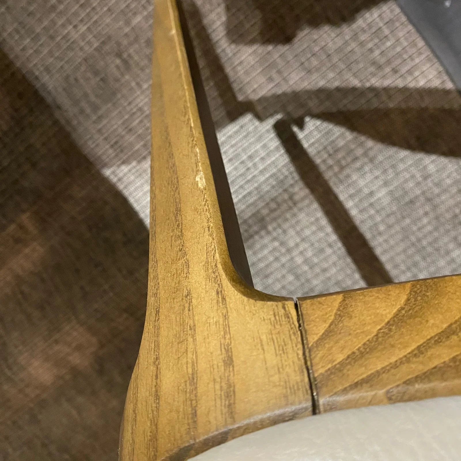OZZO Nirvana solid ash wood chair without arms, display model showcasing natural wood grain and modern design.
