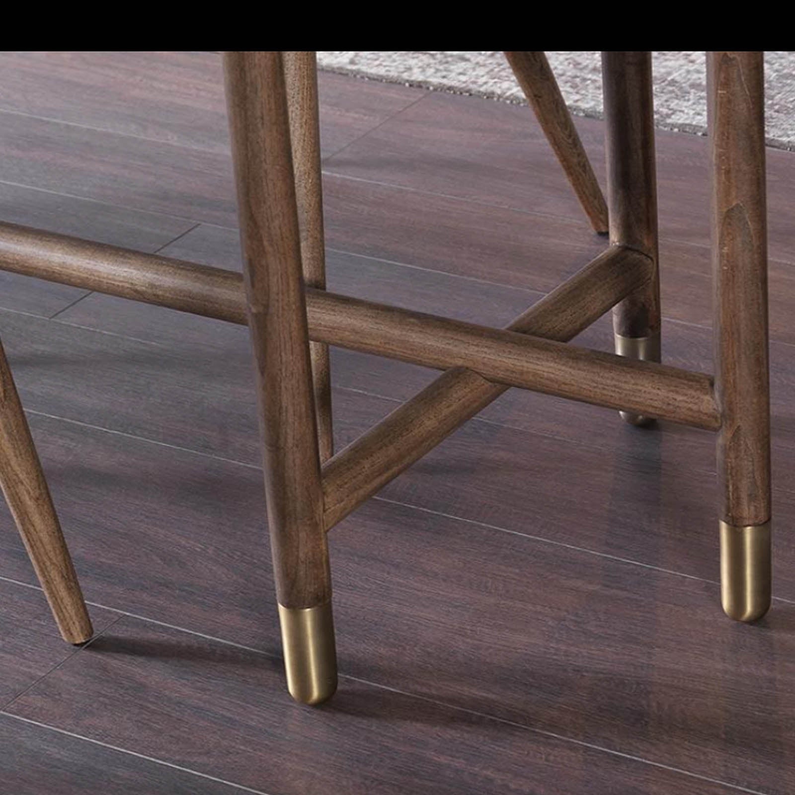 Display of the Pietra Dining Table by HOMAGE KOLTUK, showcasing its elegant stone surface and modern design.