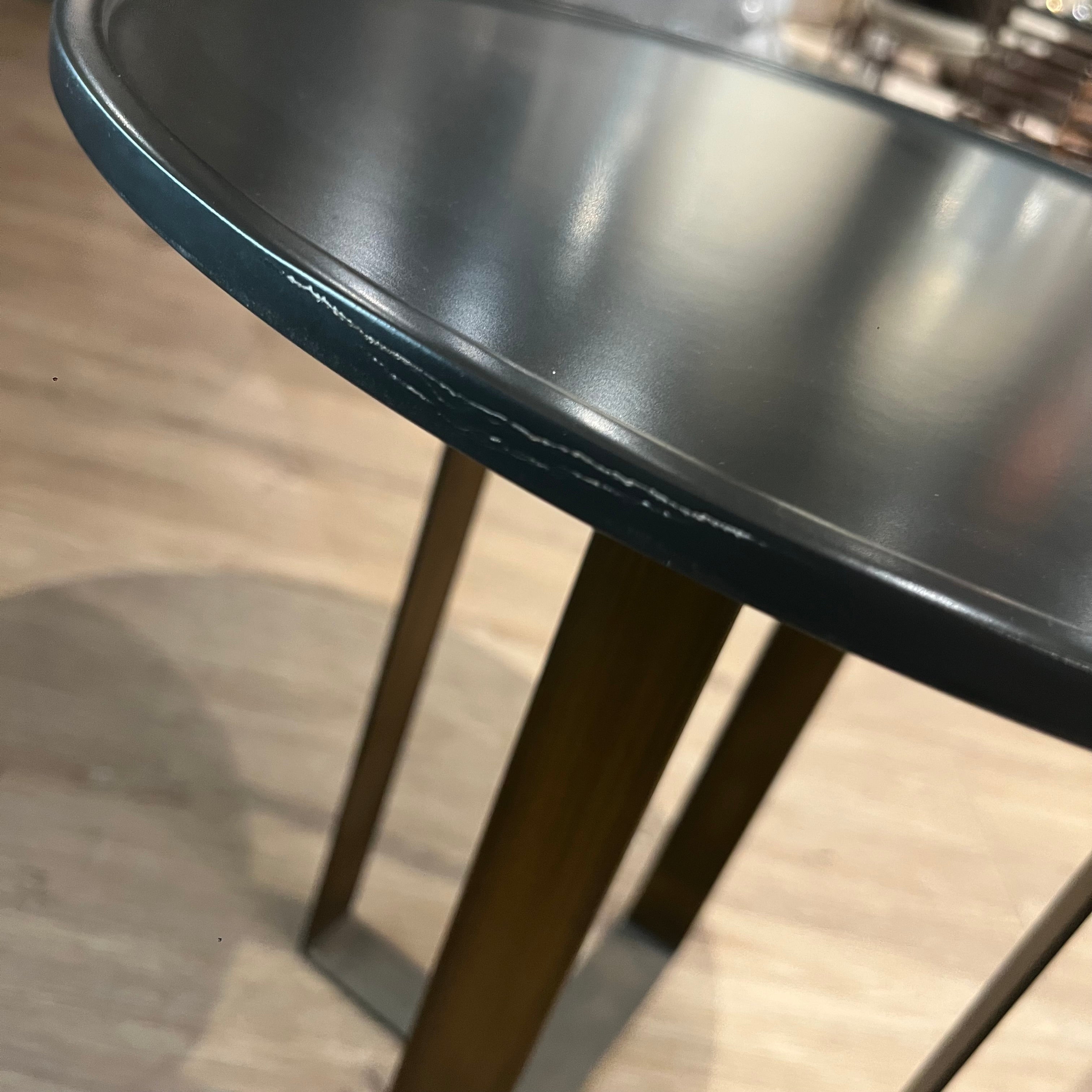 Round Pietra Kristal side table by KRISTAL MOBILYA with a clear glass top and metal frame, ideal for modern living spaces.