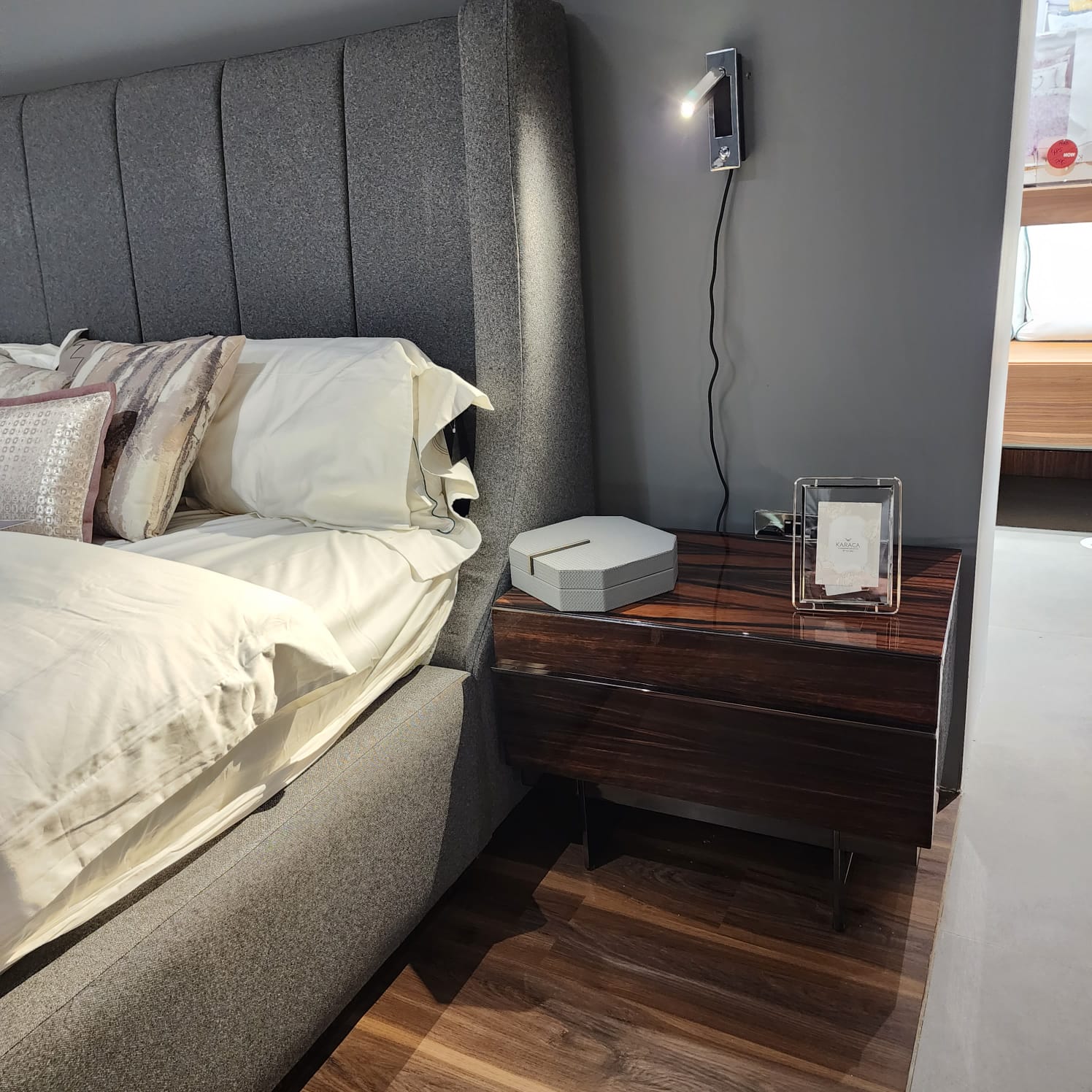 Display of Prada Elegant Bedroom Set by Nills Furniture Design, showcasing a stylish bedroom furniture arrangement with bed and matching pieces.