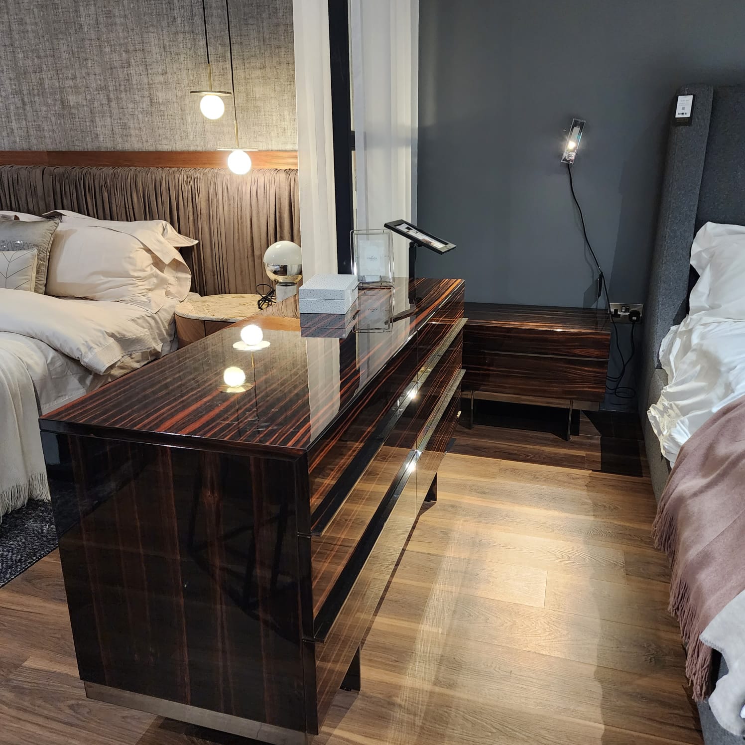 Prada Elegant Bedroom Set display item by Nills Furniture Design featuring a stylish bed, nightstands, and matching decor in a modern bedroom setting.