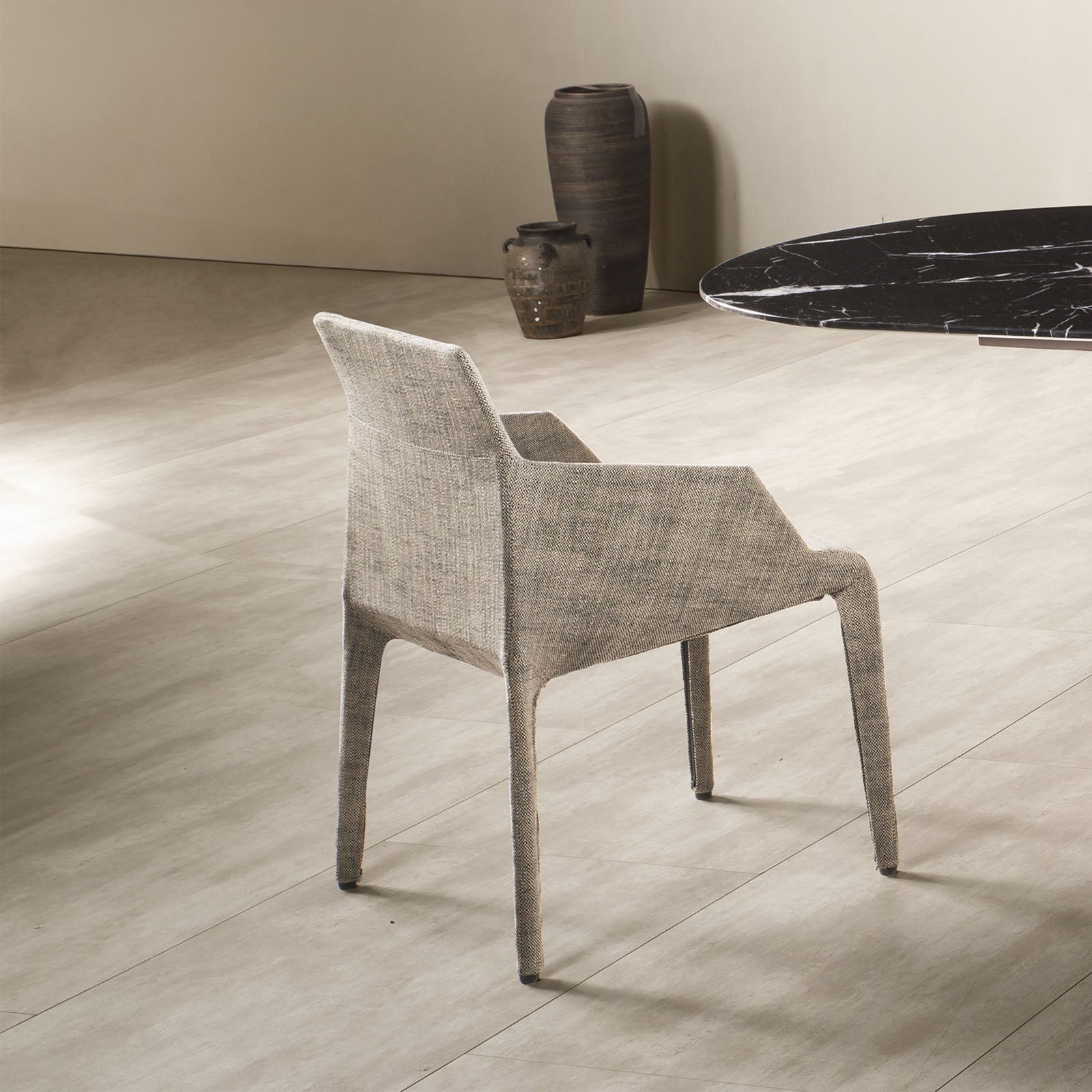Display image of a Sandra Chair DC005YAS by Beacon, showcasing its modern design and fabric upholstery.