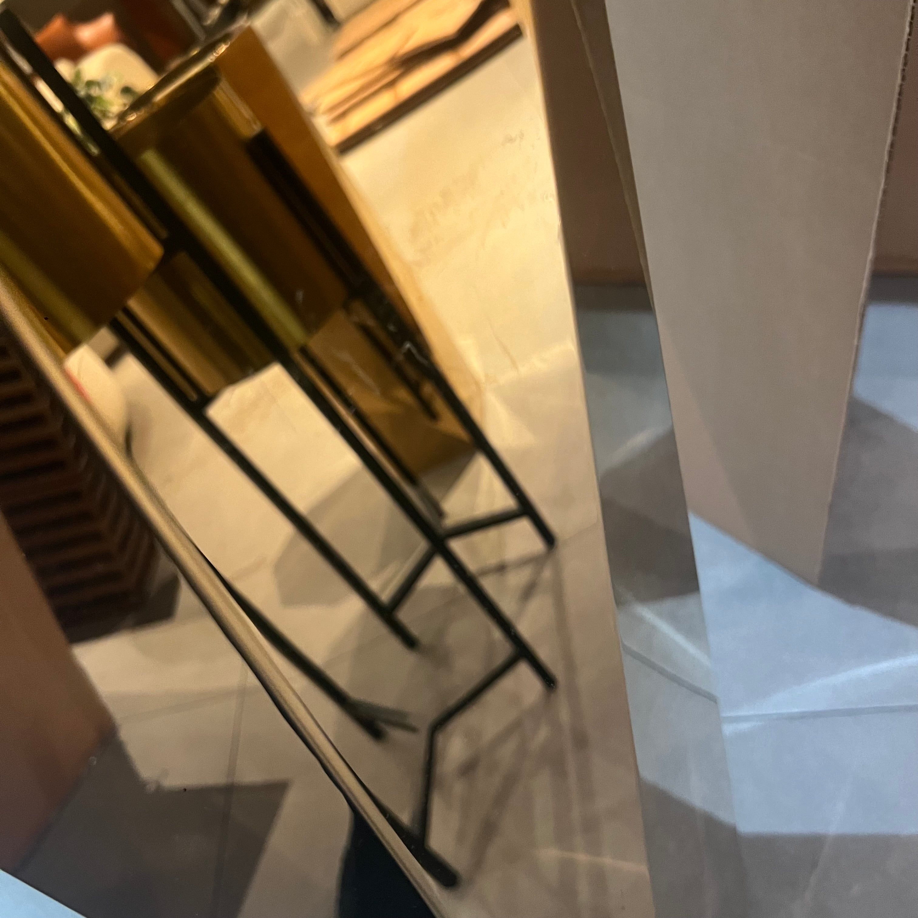 Set of three large stainless steel planter boxes with sleek, modern design, perfect for displaying indoor or outdoor plants.