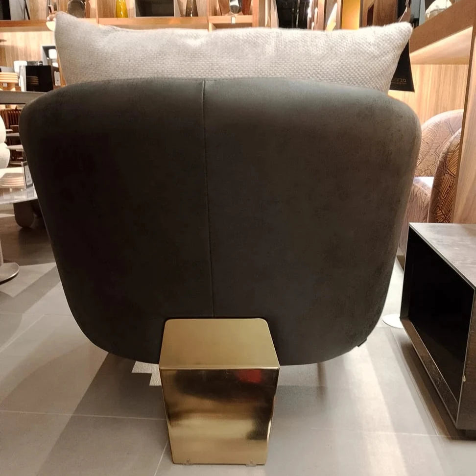 Saloni Tesla Armchair Tesla-001-YAS display item with sleek modern design, showcasing smooth upholstery and stylish armrest details.