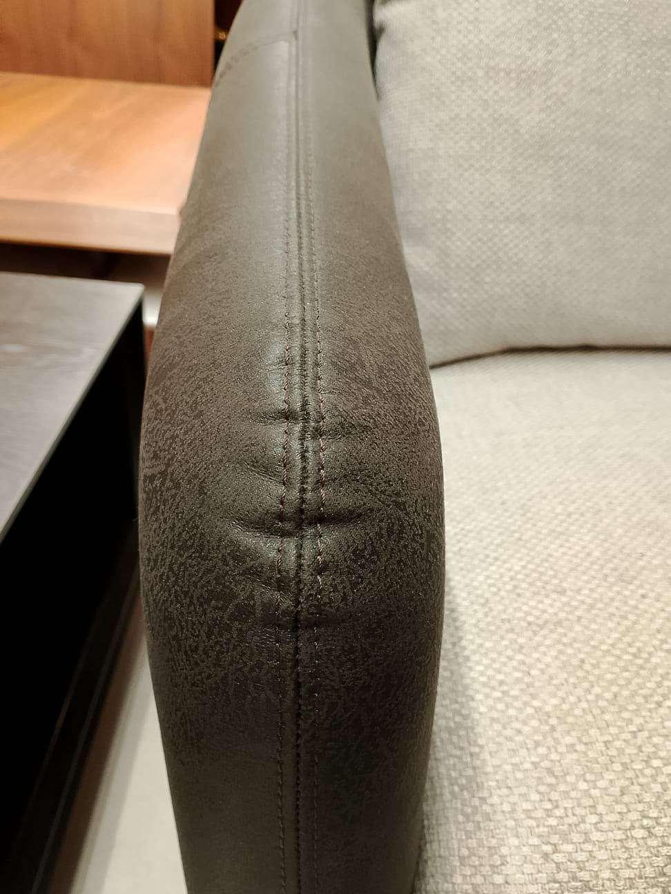 Tesla Armchair SALONI Tesla-001-YAS display model with plush fabric and modern design, shown in a neutral setting.